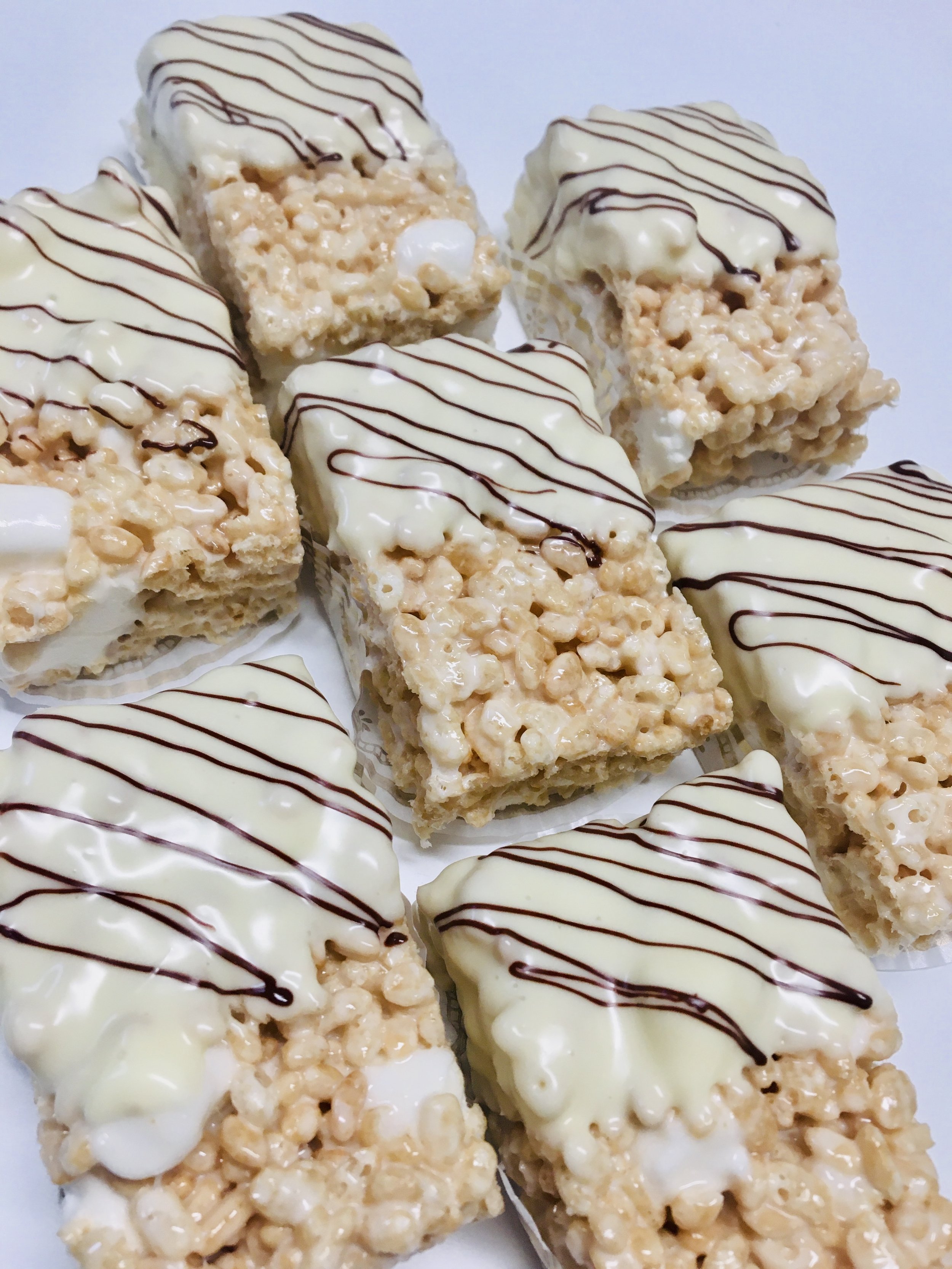 rice krispies - white with chocolate drizzle.jpeg