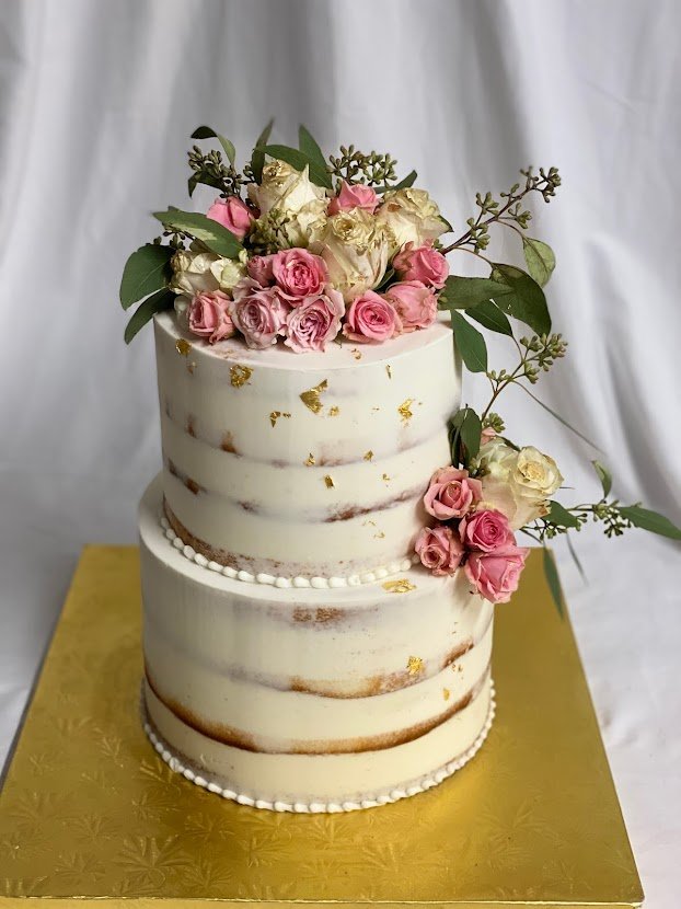 2 tier semi naked with flowers and gold.jpg