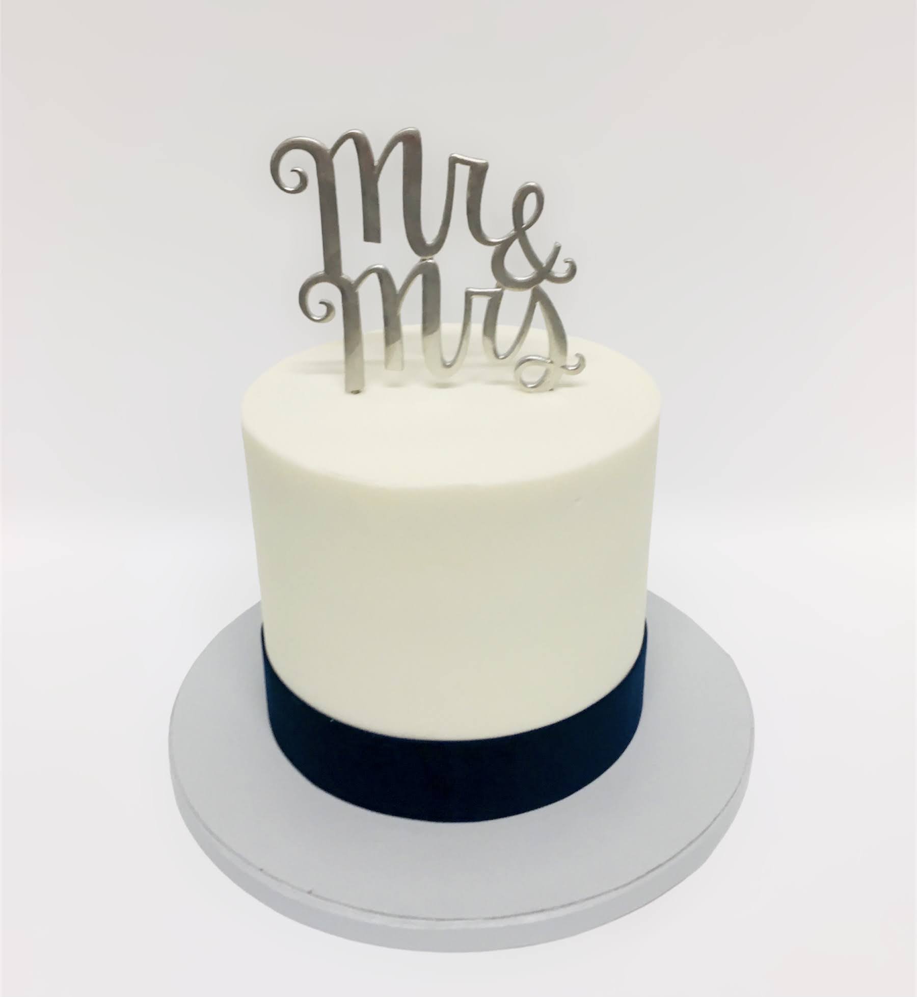 1T white cake with black ribbon.jpg