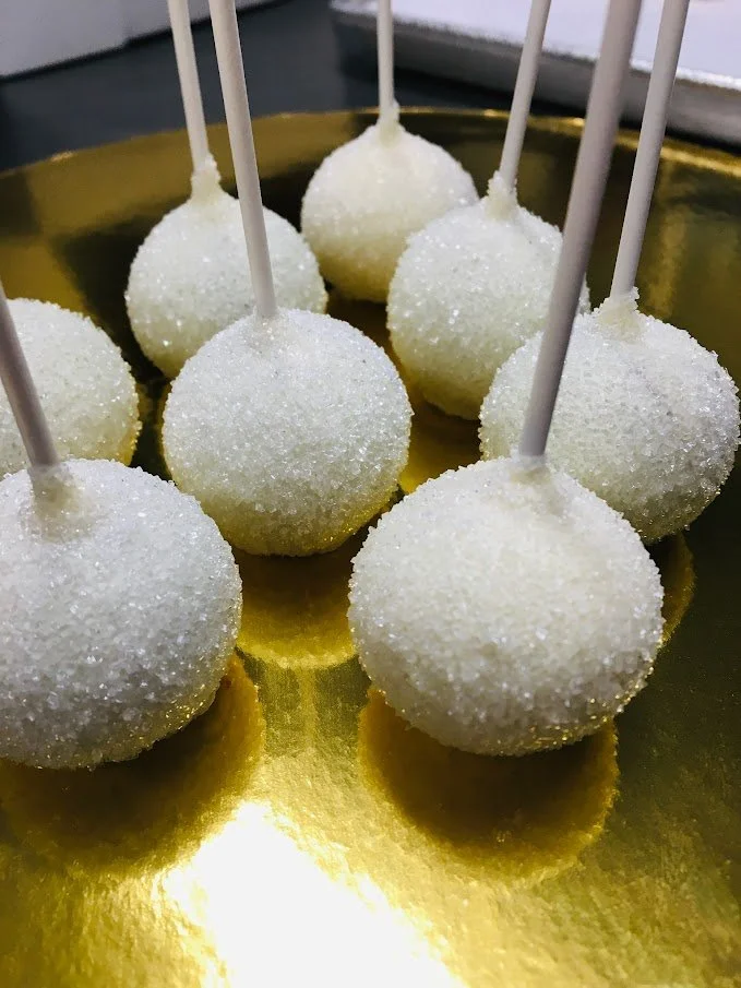 white sprinkle cake pops.JPG