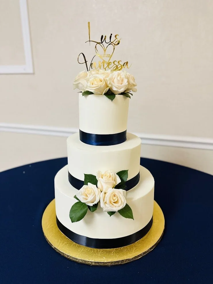 white with blue ribbon and white flowres.jpg