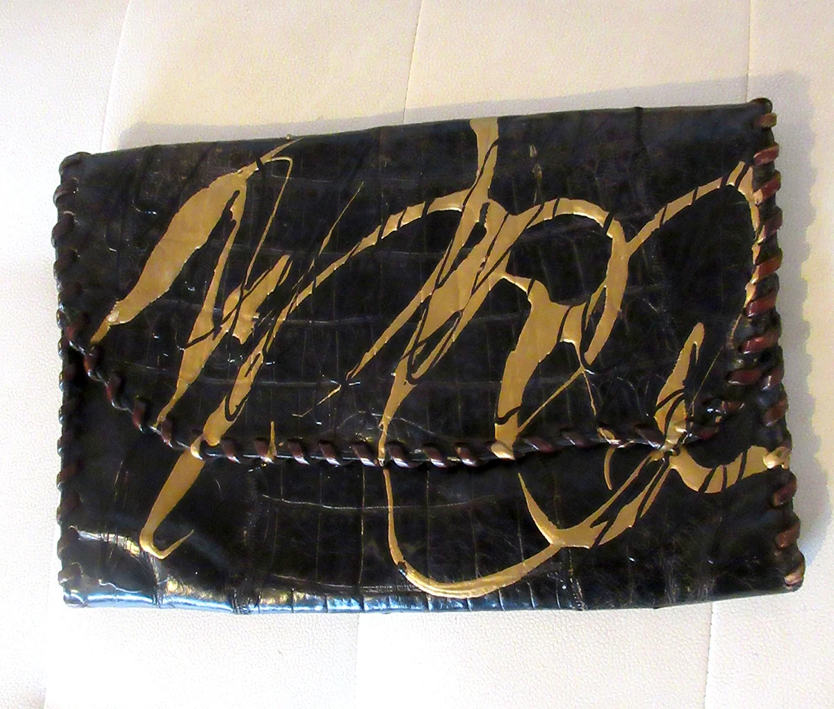 CARLOS FALCHI dk brown leather clutch