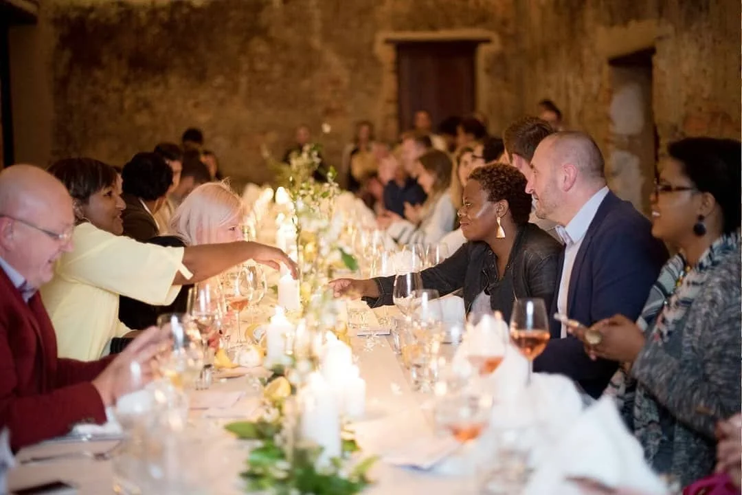 2023-secret-eats-how-it-works-6-guests-meeting-at-secret-dinner-table.jpg