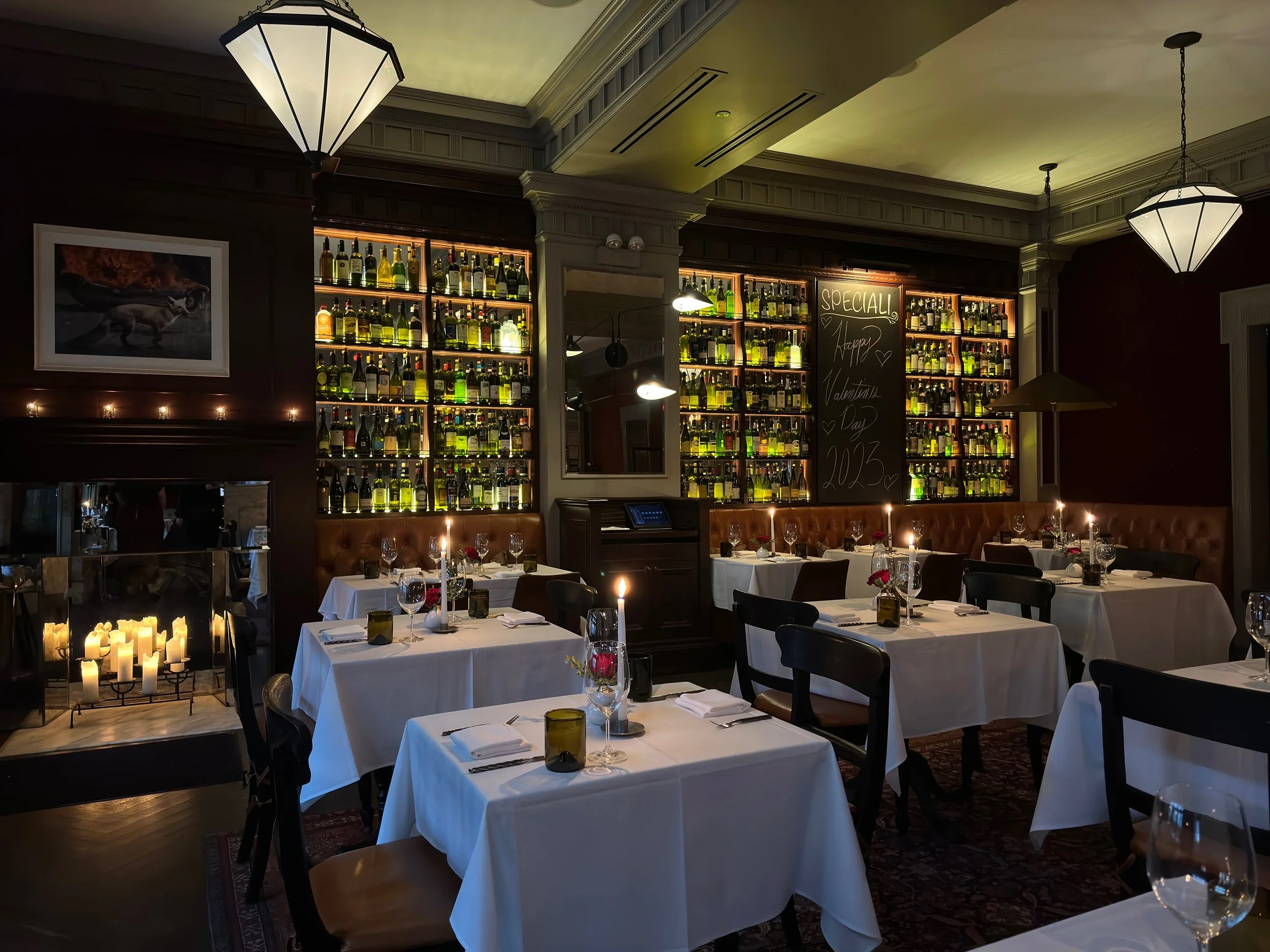 acanto dining room lit by candlelight