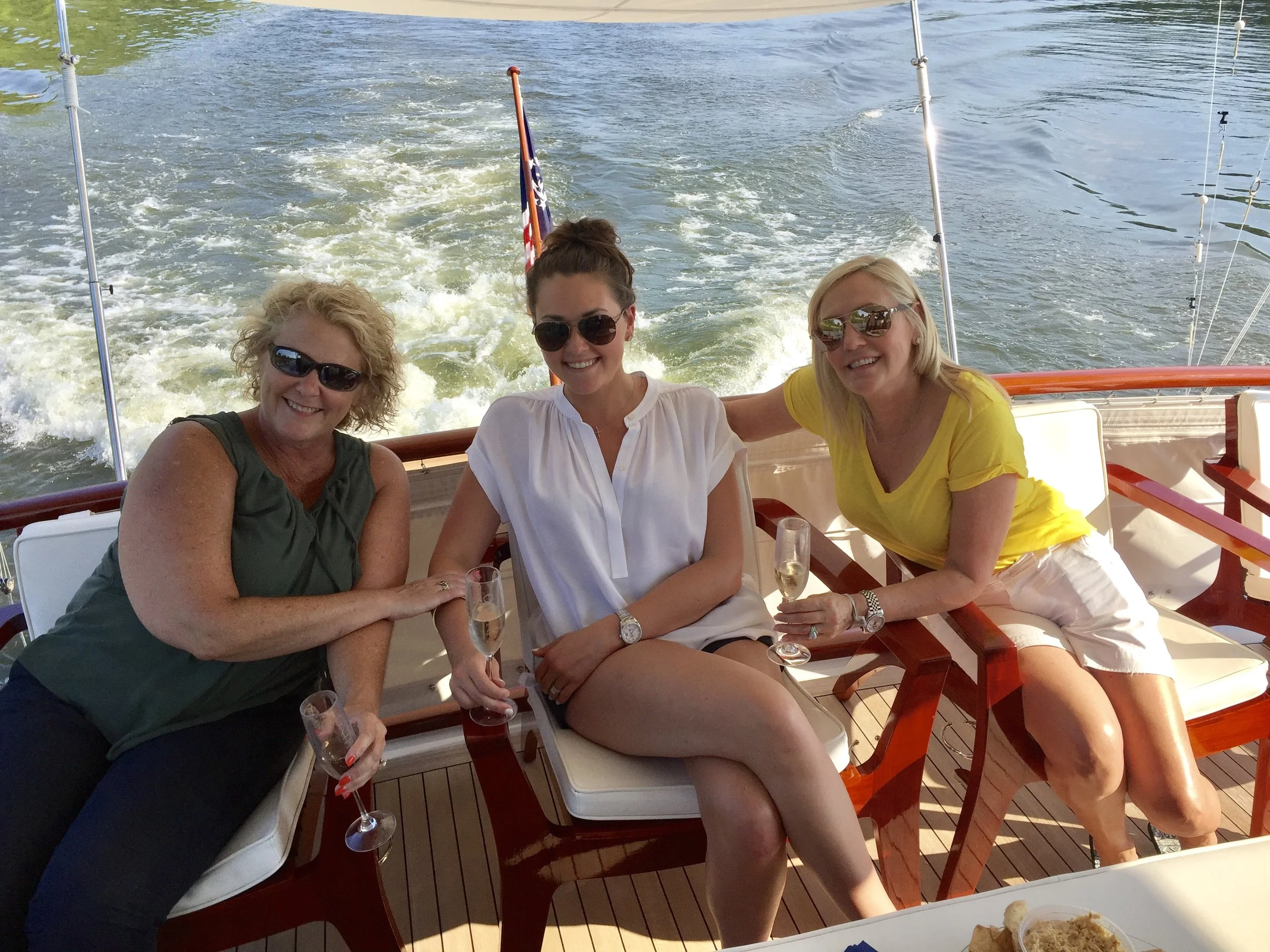 Mattie with her mom (right) and Ben’s mom (left).