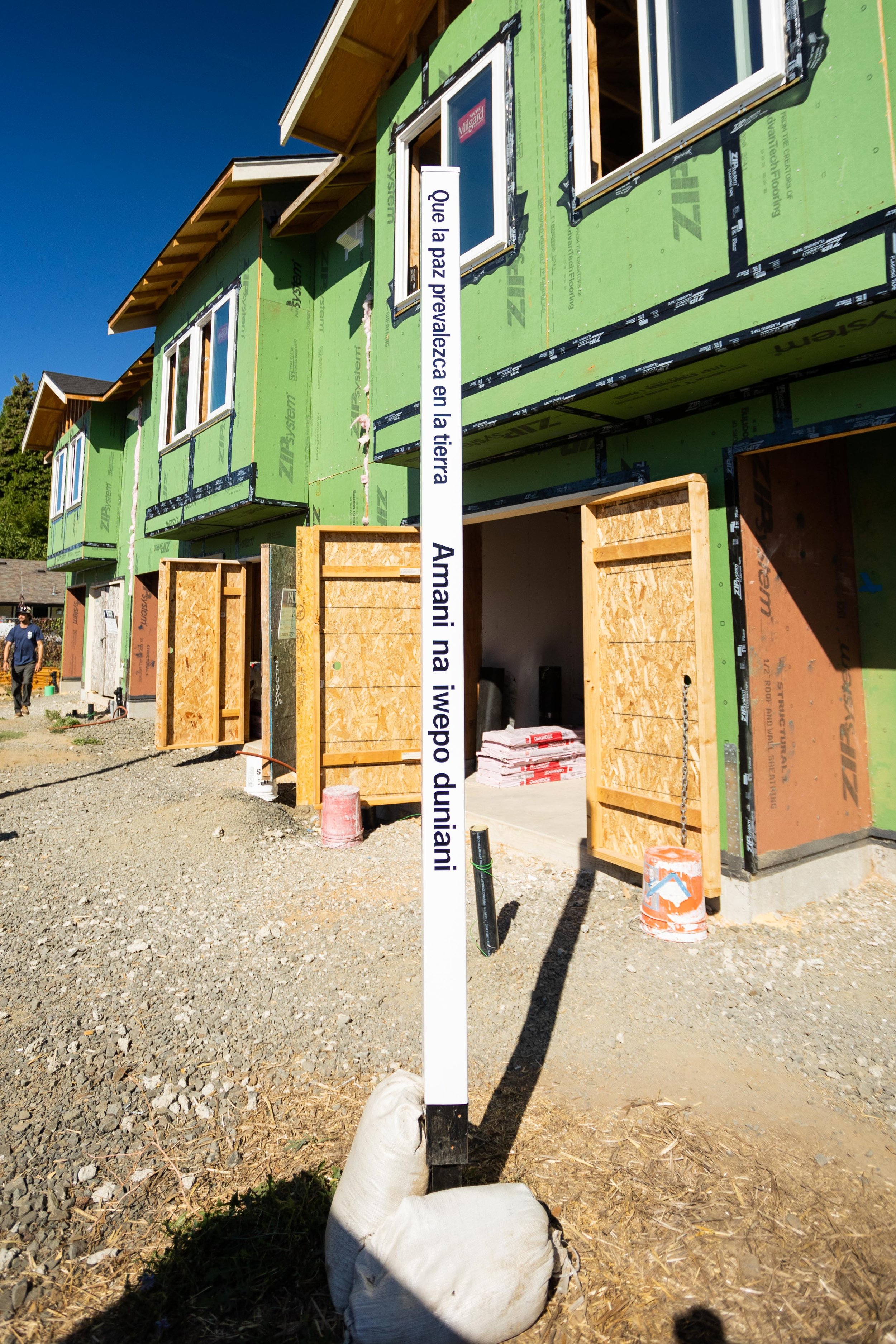  Hillsboro, OR - Working with Habitat For Humanity, the Oregon Peace Builders planted and dedicated a Peace Pole at Alder Commons homesites Saturday Sept. 24 
