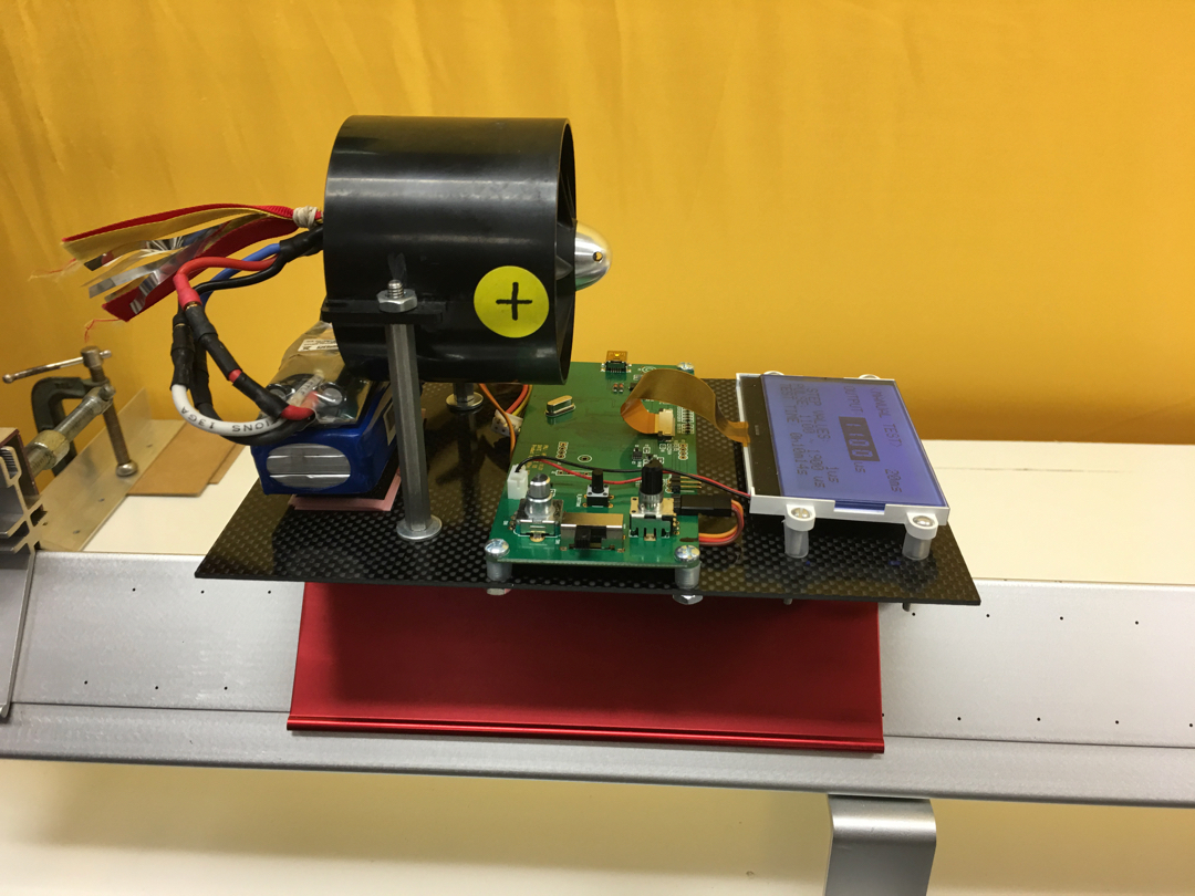 To collect data, students analyze videos in Pivot Interactives of an air-track glider driven by a battery-powered turbine. We designed and built the turbine-powered glider with an electronic speed control that allows the turbine to be precisely adjusted for repeated trials. This apparatus costs hundreds of dollars to fabricate, and is not safe for use in a classroom.