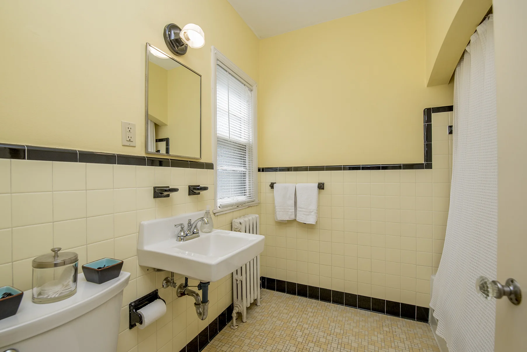 Period-specific finishes have been restored in the bathroom.