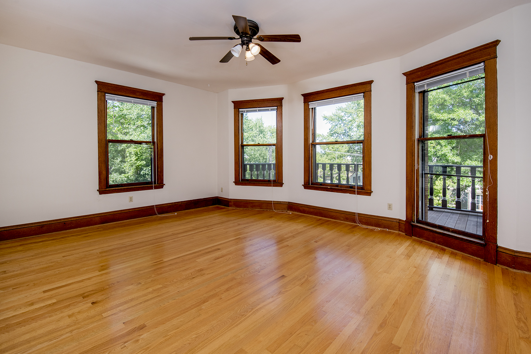 Living room with access to front balcony.