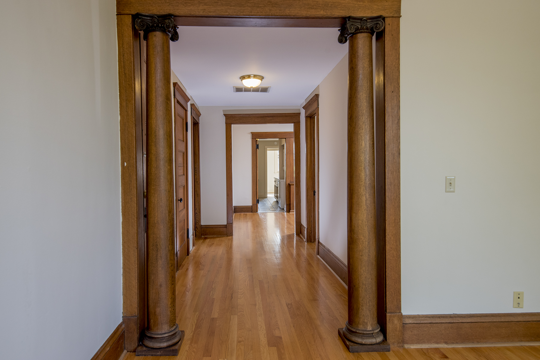 This is the view from the living room looking back in to the apartment. Stunning woodwork all around!