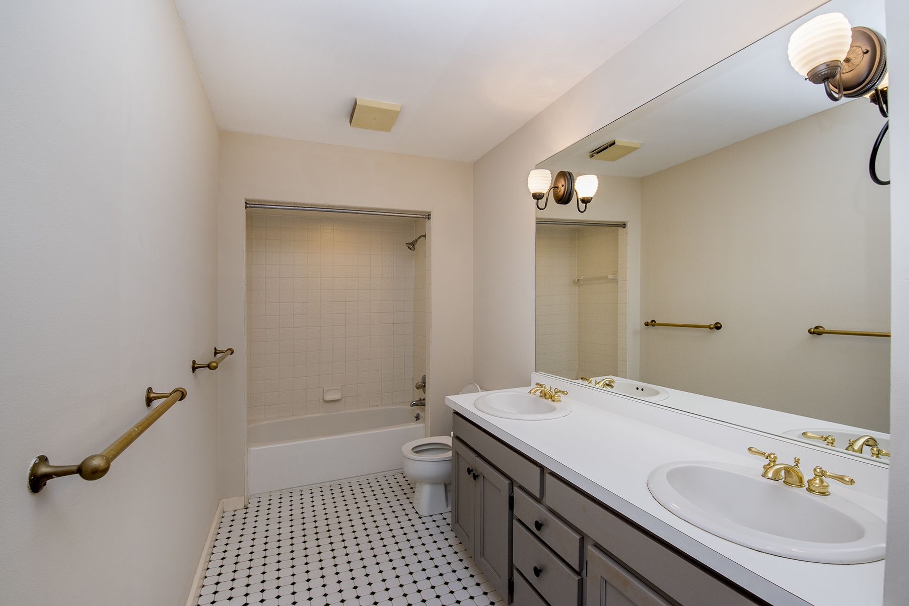 Spacious bathroom with double vanity.