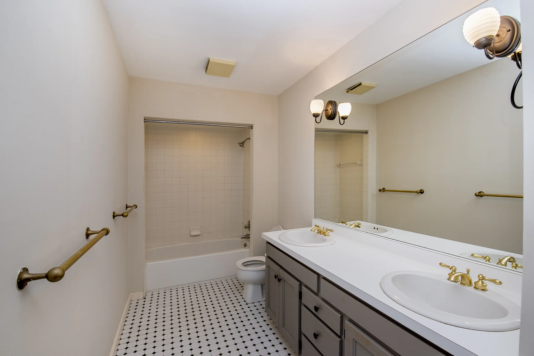 Spacious bathroom with double vanity.