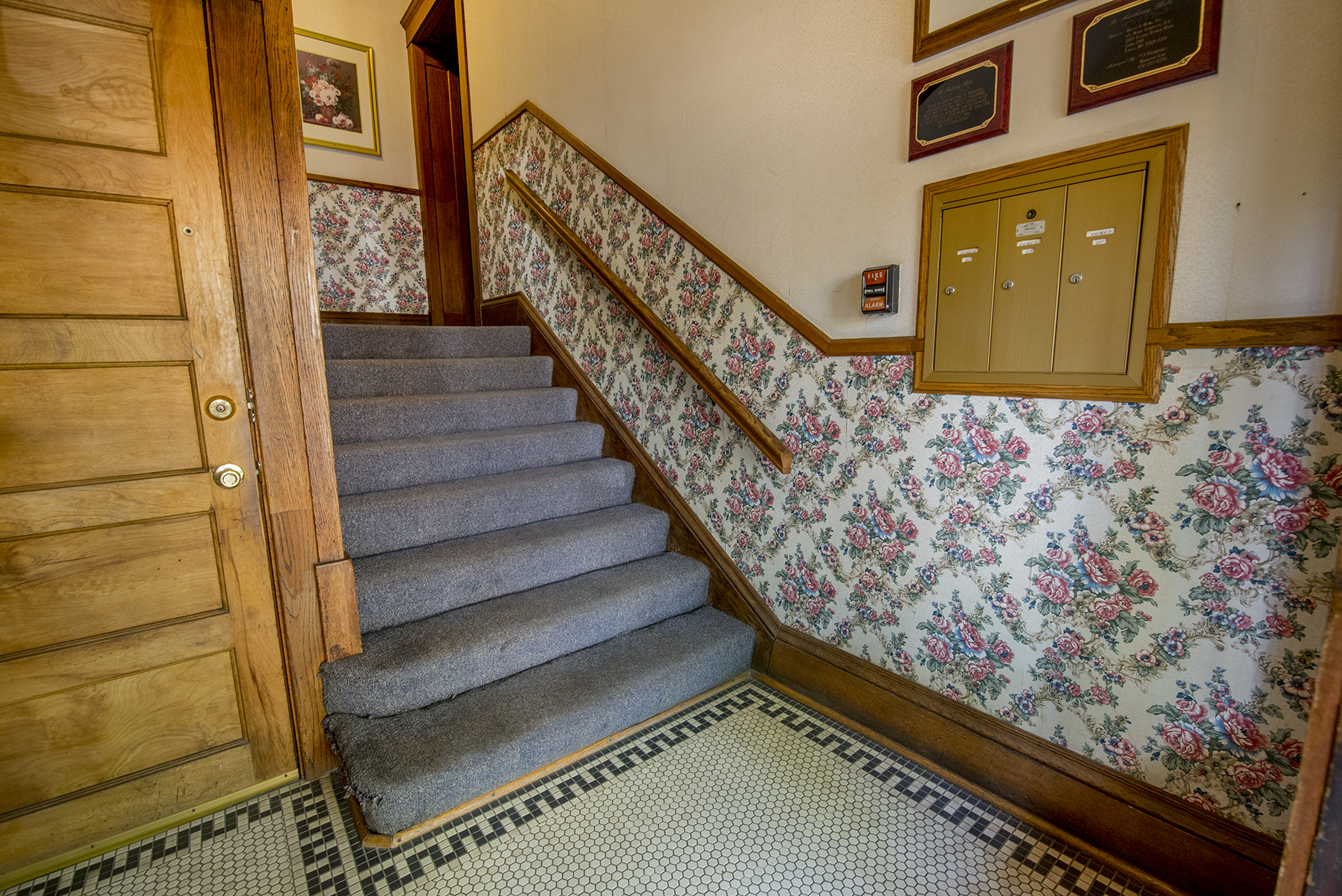 Front entryway welcomes you home with period specific decor.