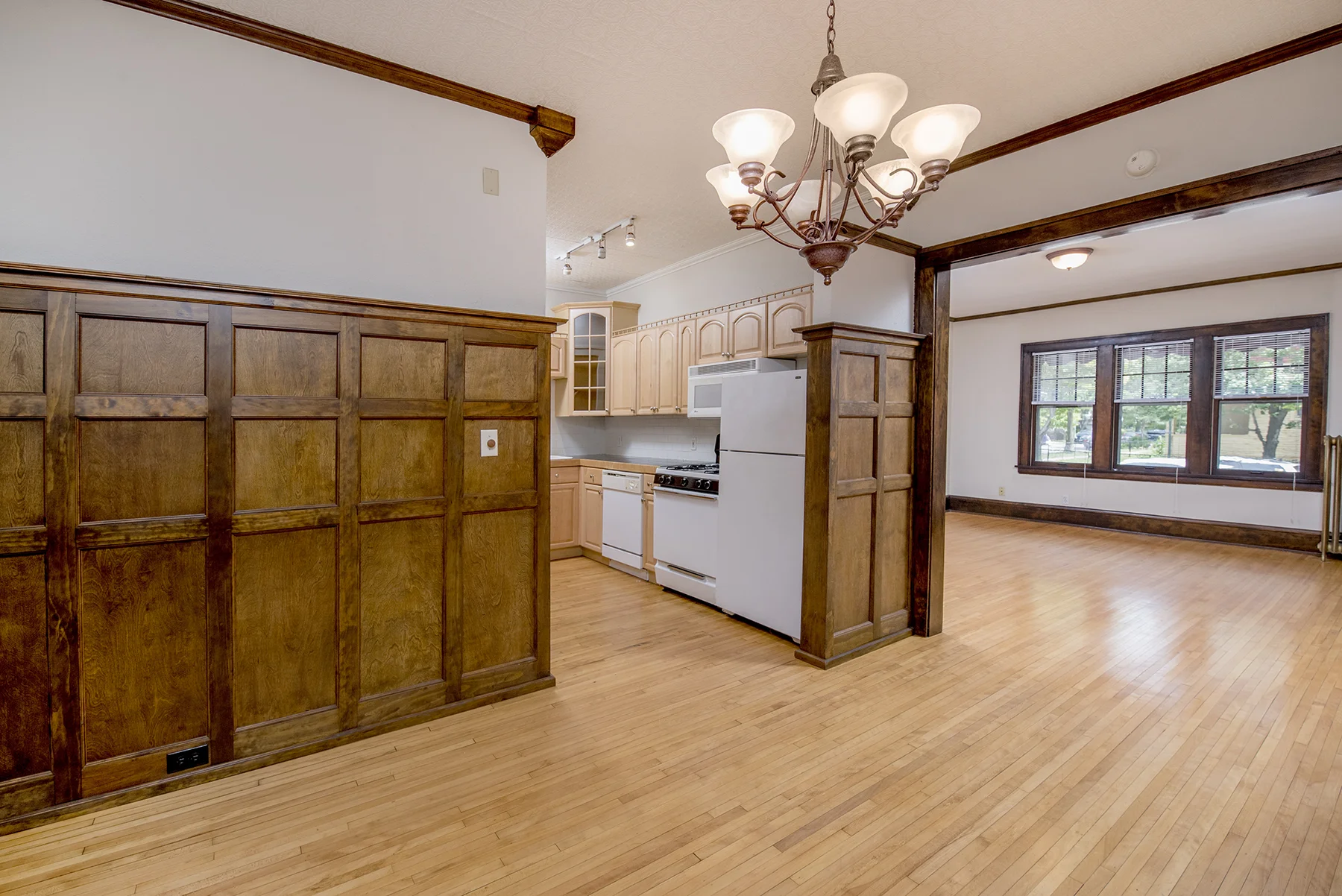 Beautifully restored wood paneling is original to the building's construction.
