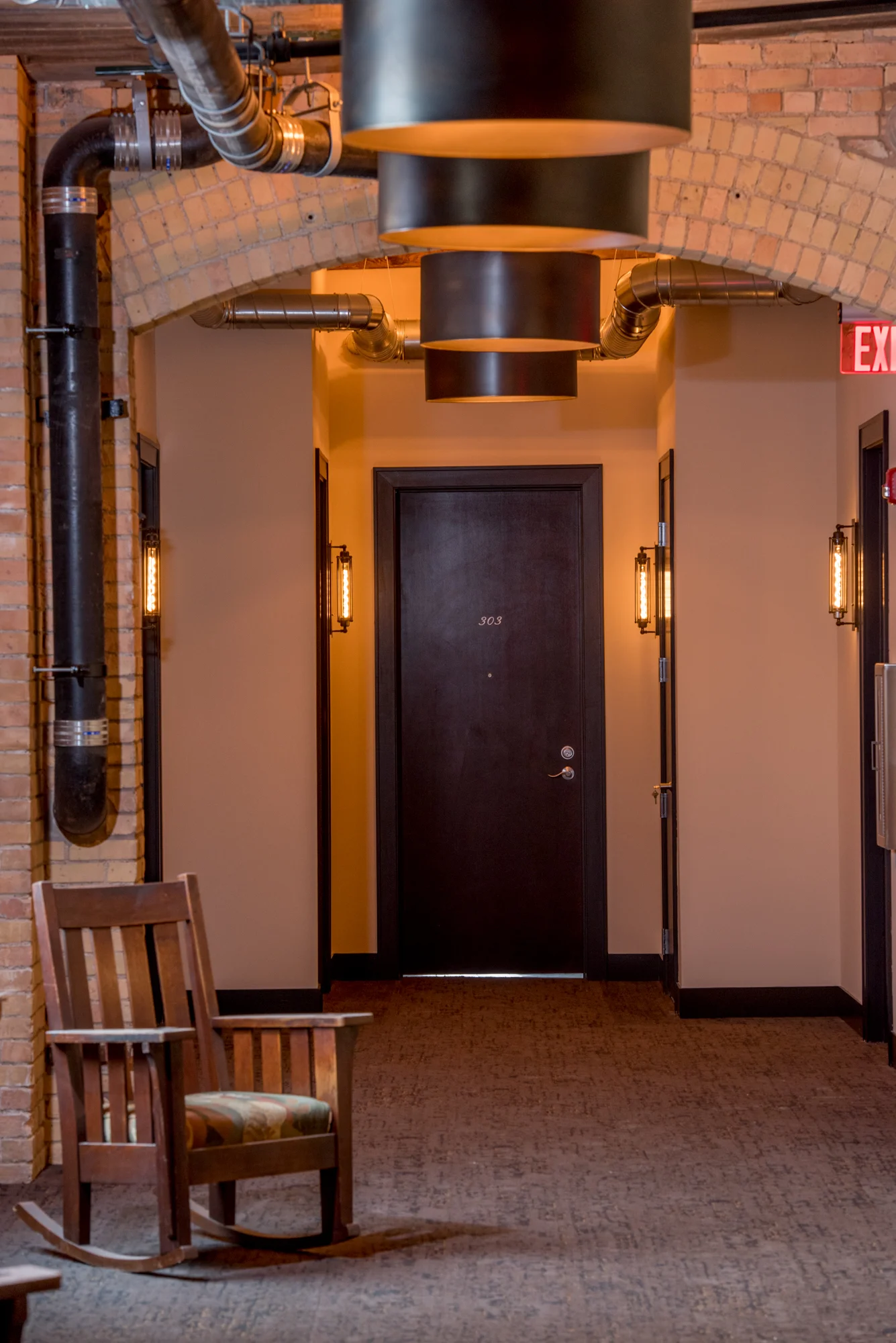 Edison lightbulbs give a warm glow to communal spaces within the building