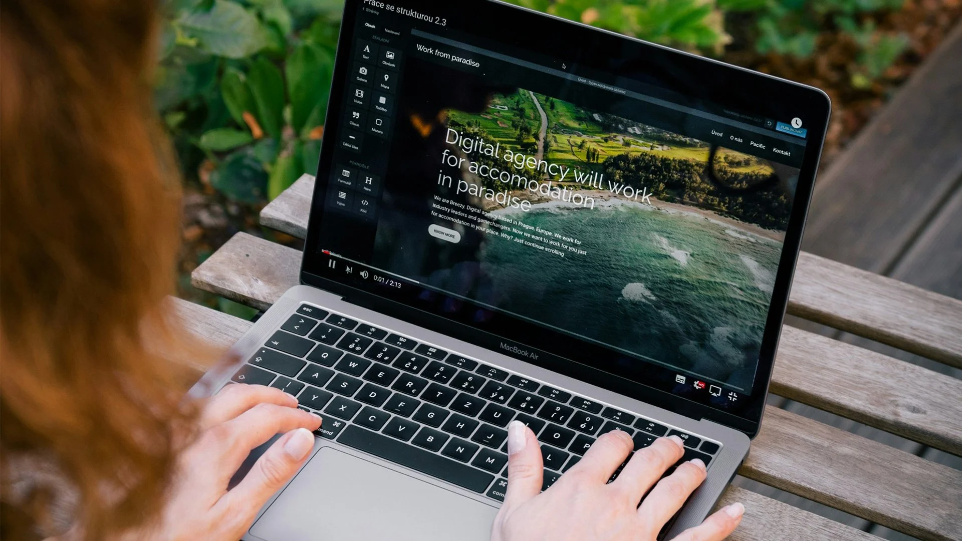 Woman works on her website