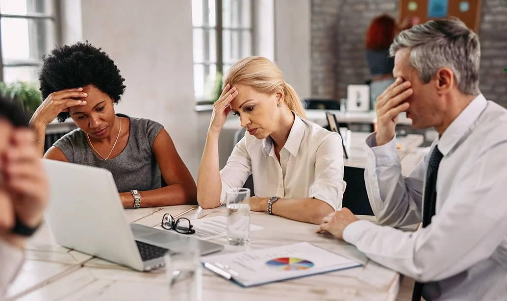 Group of stressed board members
