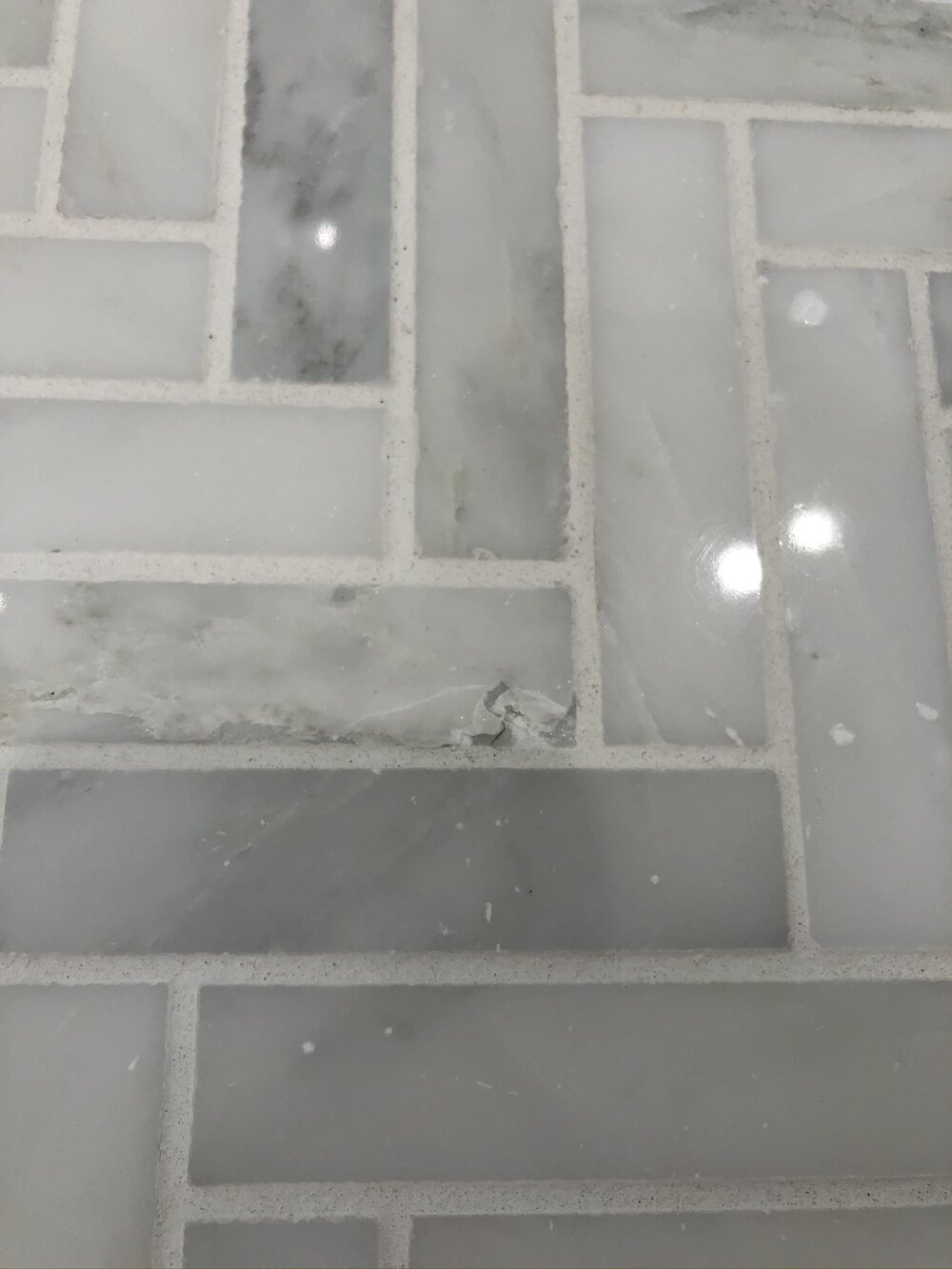 Shower Tile Damage