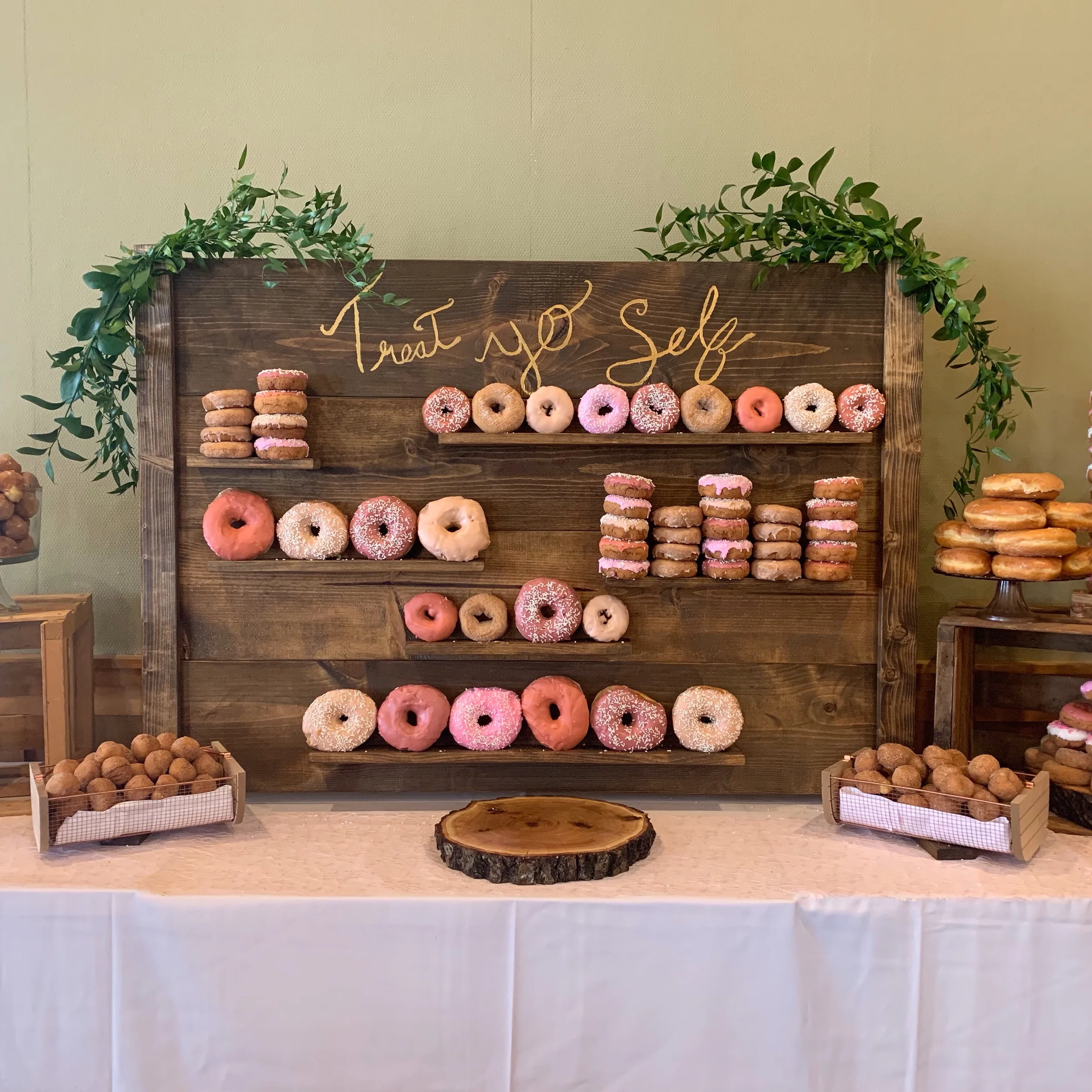 Customized Dessert Wall - You can customize the top sign to say whatever you want! 4x4 structure can fit donuts, dessert shooters, cupcakes and more! We also have cake stands to create a complete look. $75 for the wall (includes delivery, set up and tear down with in 25 miles of Minneapolis) Outside of that add a delivery fee $25-$50 add $25 to customize the signage add $25 for extra cake stands