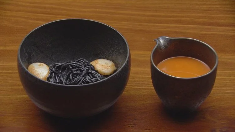 Crab Bisque with squid ink spaghetti.jpeg