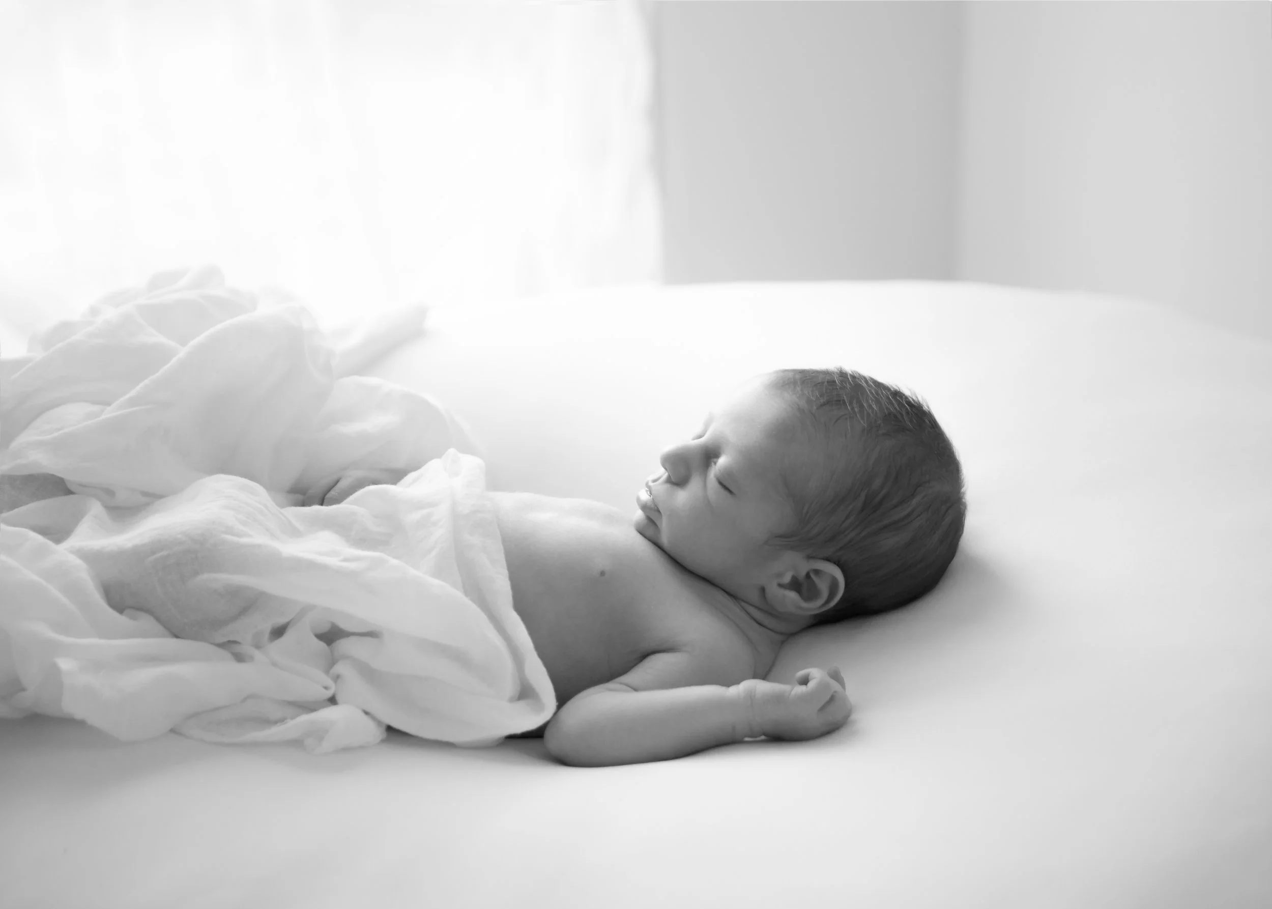 Simple and natural newborn photography to bring the focus on your babies beautiful features by Michelle Petkovic Photography in Paralowie.
