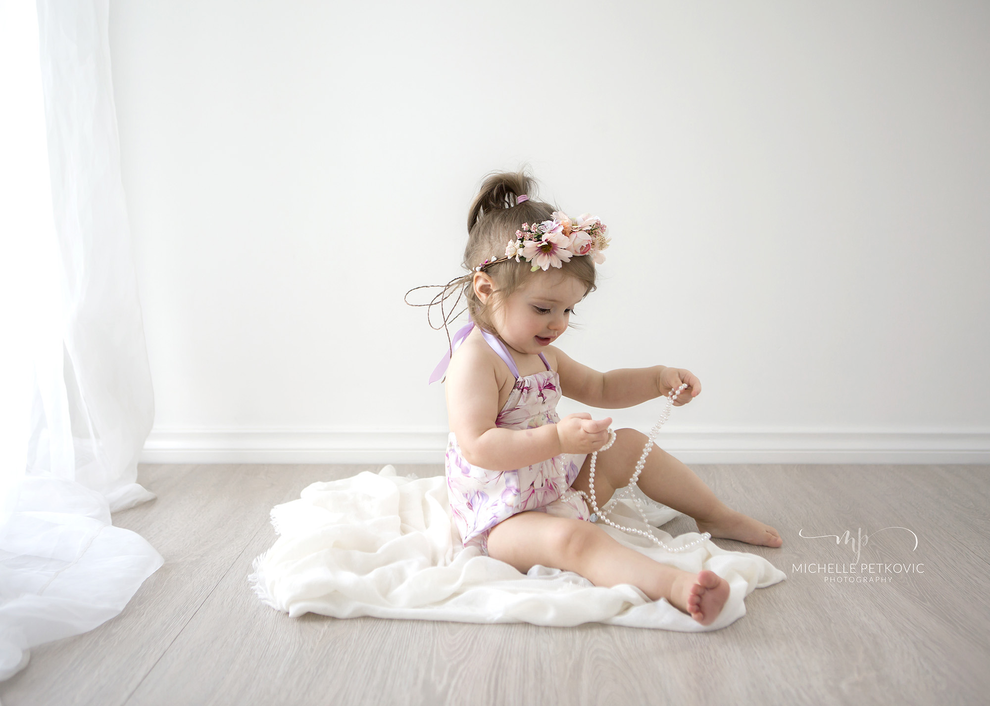  Lilac halterneck floral onesie.  Size 1.  Clients flower crown is from Lily &amp; Lace  