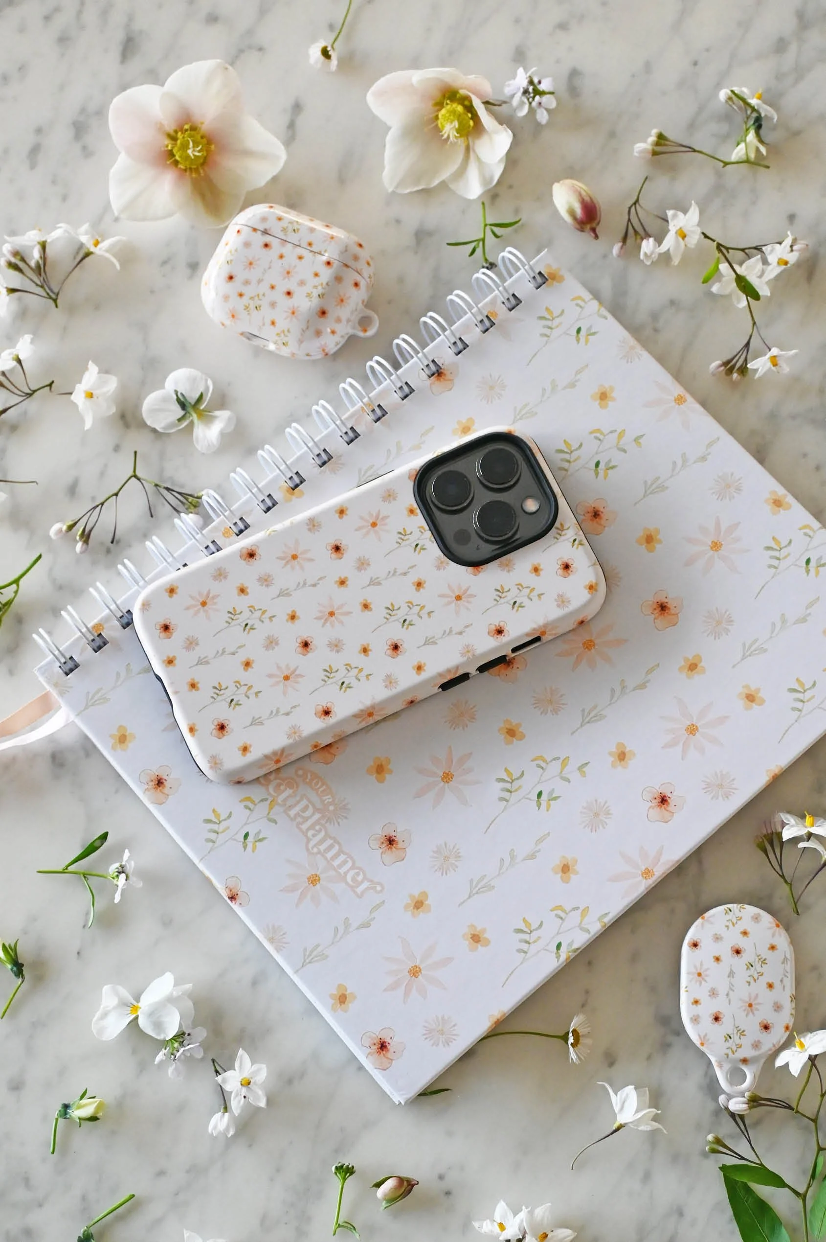 theo-floral-phone-airpods-airtag-case.jpg