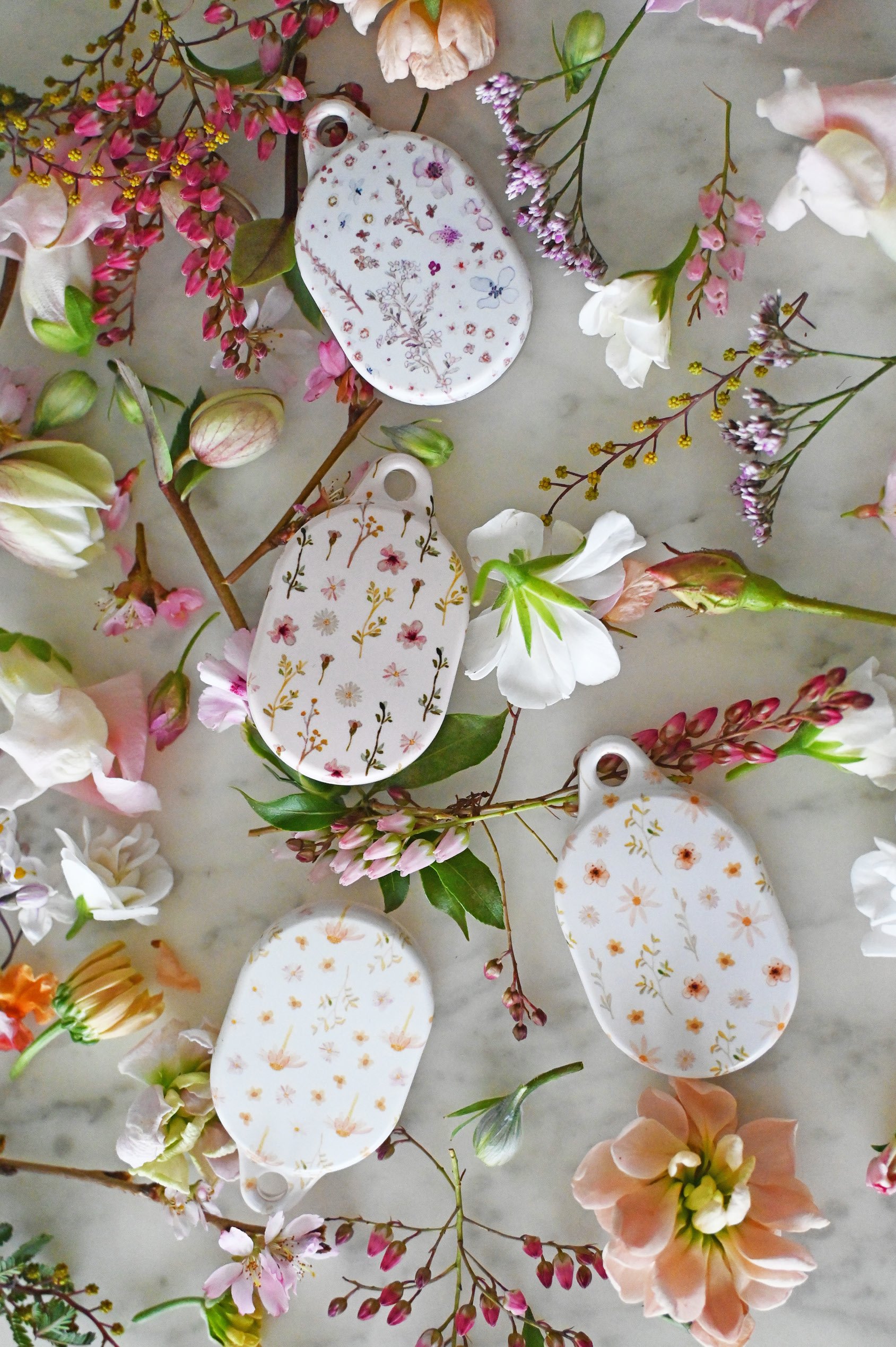 talia-designs-floral-airtag-cases.jpg