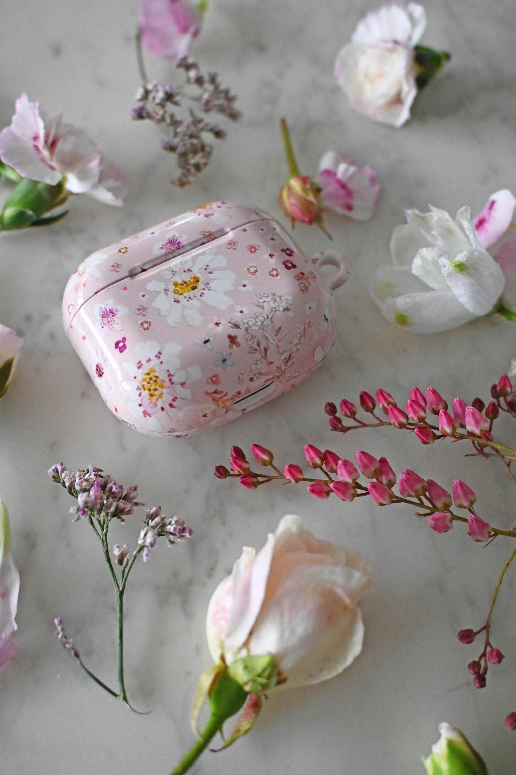 myra-airpod-case-flowers.jpg