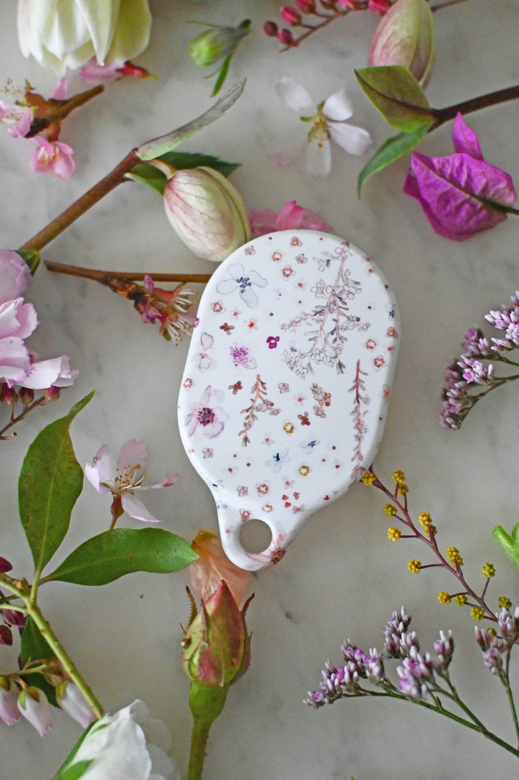 ariyah-cute-floral-airtag-case.jpg