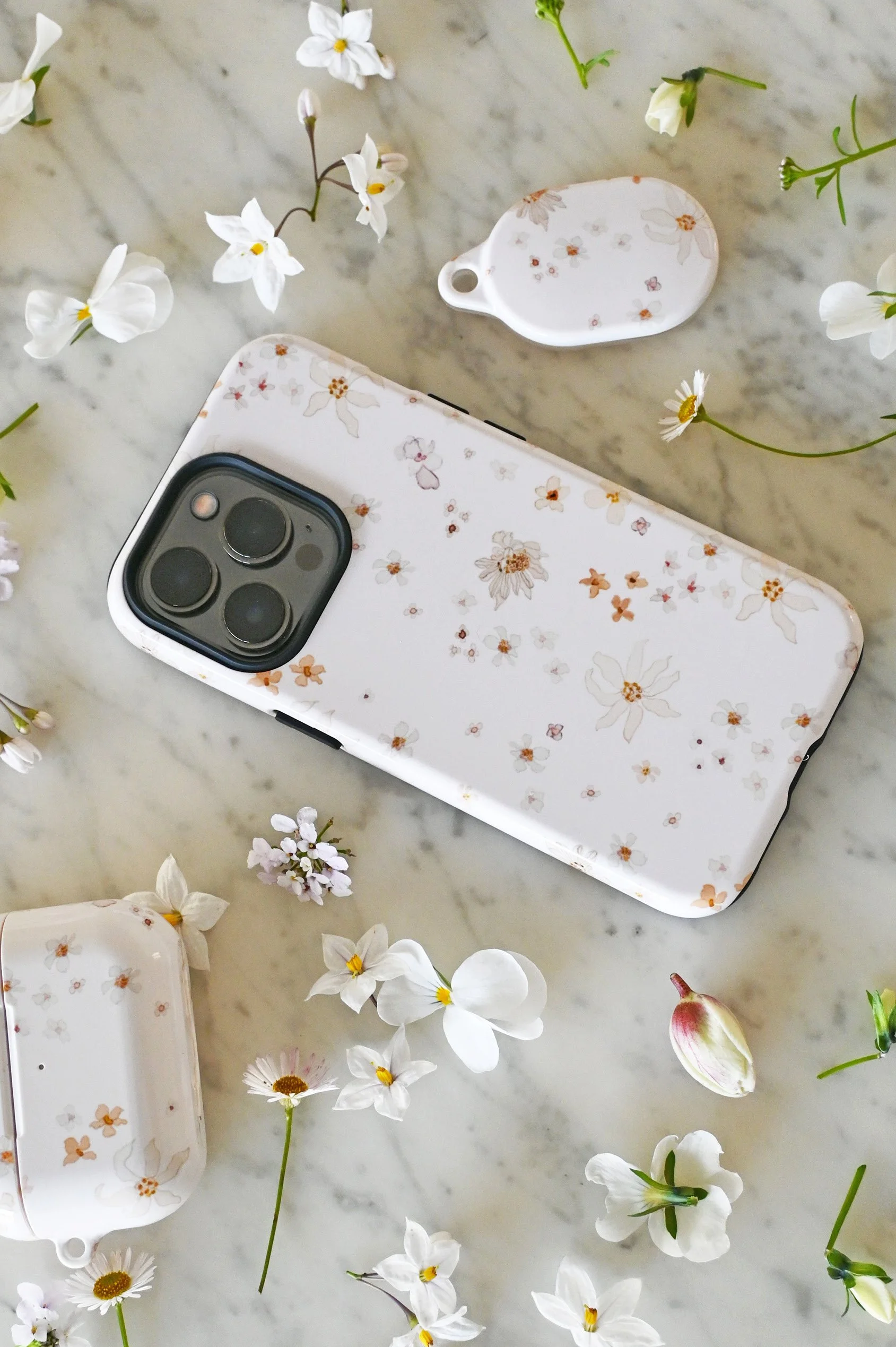 cosette-floral-matching-phone-airpods-airtag-case-set.jpg