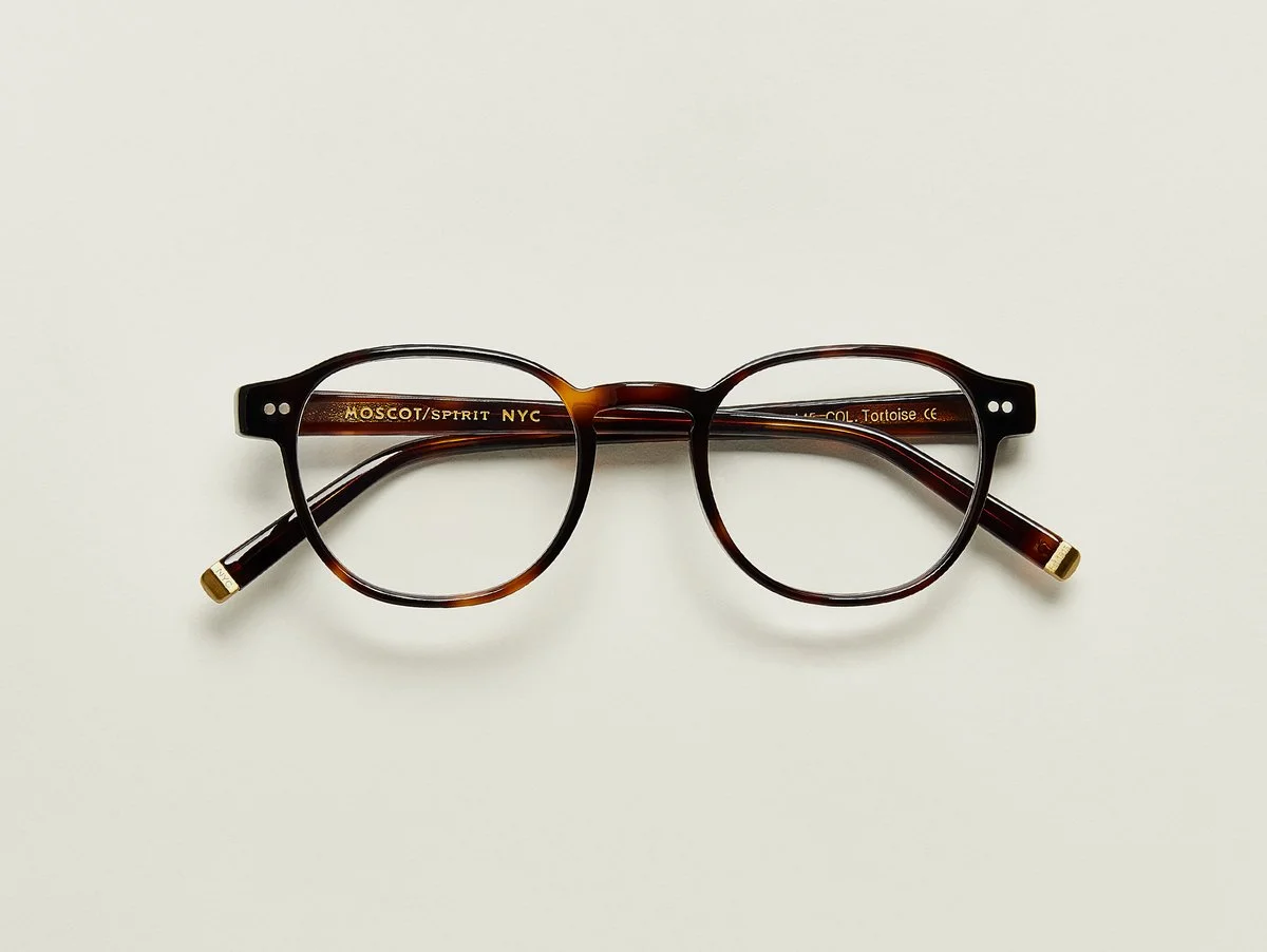 MOSCOT - Arthur Opticals £245 COLOUR Tortoise SIZE 50 This frame is based on The LEMTOSH silhouette, but with a slimmed down look, a thinner gauge, and a key hole bridge that's just a bit more business. They say not to mix business with pleasure, but we couldn't help ourselves. Features two dot rivets Comfortable key hole nose bridge Includes acetate nose pads 3-Barrel hinge MOSCOT temple engravings