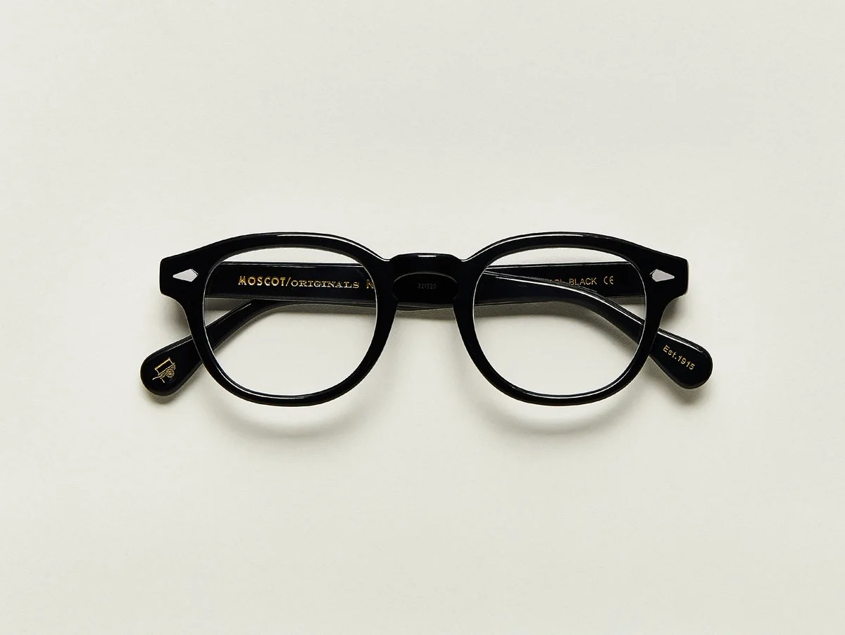 MOSCOT - Lemtosh Opticals £245 COLOUR Black SIZE 46 & 52 This rounder number has served as the calling card for generations of creative, thoughtful, free-spirited intellectuals and artistes – from James Dean to Johnny Depp. Handcrafted using Italian acetate featuring unique patterns distinctive to each frame Features diamond rivets Comfortable key hole nose bridge Includes acetate nose pads 7-Barrel hinge MOSCOT temple engravings Signature acetate tips
