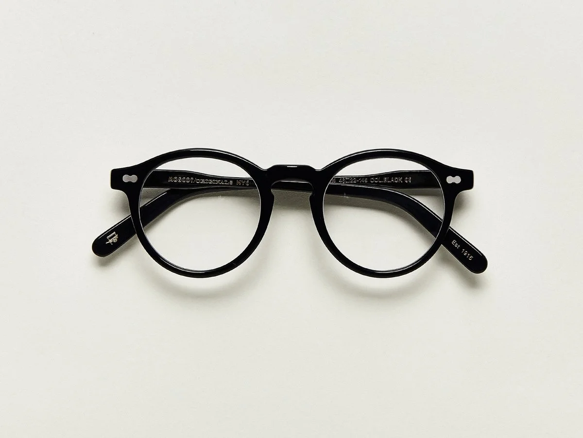 MOSCOT - Militzen Opticals £245 COLOUR Black SIZE 46 The round, full-vue MILTZEN, first introduced in the 1930s, is eponymously named for our Uncle Heshy, who inexplicably everyone called Uncle Miltzen. And it stuck. So there you go, world... The MILTZEN. Handcrafted using Italian acetate Features adjoined dot rivets Comfortable key hole nose bridge Includes acetate nose pads 3-Barrel hinge MOSCOT temple engravings