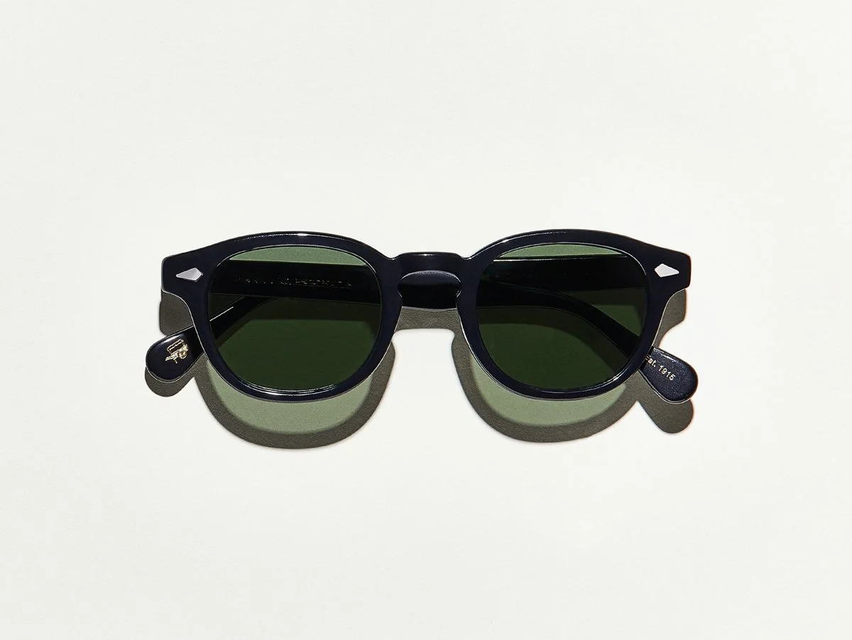 MOSCOT - Lemtosh Sunglasses £265 COLOUR Black SIZE 46 This rounder number has served as the calling card for generations of creative, thoughtful, free-spirited intellectuals and artistes – from James Dean to Johnny Depp. Handcrafted using Italian acetate featuring unique patterns distinctive to each frame Features diamond rivets Features real glass lenses in G-15