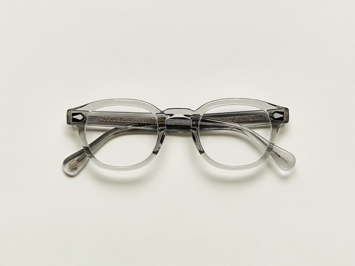MOSCOT - Lemtosh £245 COLOUR Light Grey SIZE 52 This rounder number has served as the calling card for generations of creative, thoughtful, free-spirited intellectuals and artistes – from James Dean to Johnny Depp. Handcrafted using Italian acetate featuring unique patterns distinctive to each frame Features diamond rivets Comfortable key hole nose bridge Includes acetate nose pads 7-Barrel hinge MOSCOT temple engravings Signature acetate tips