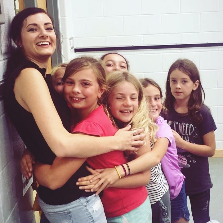 Students Giveing Elsie a Hug.jpg