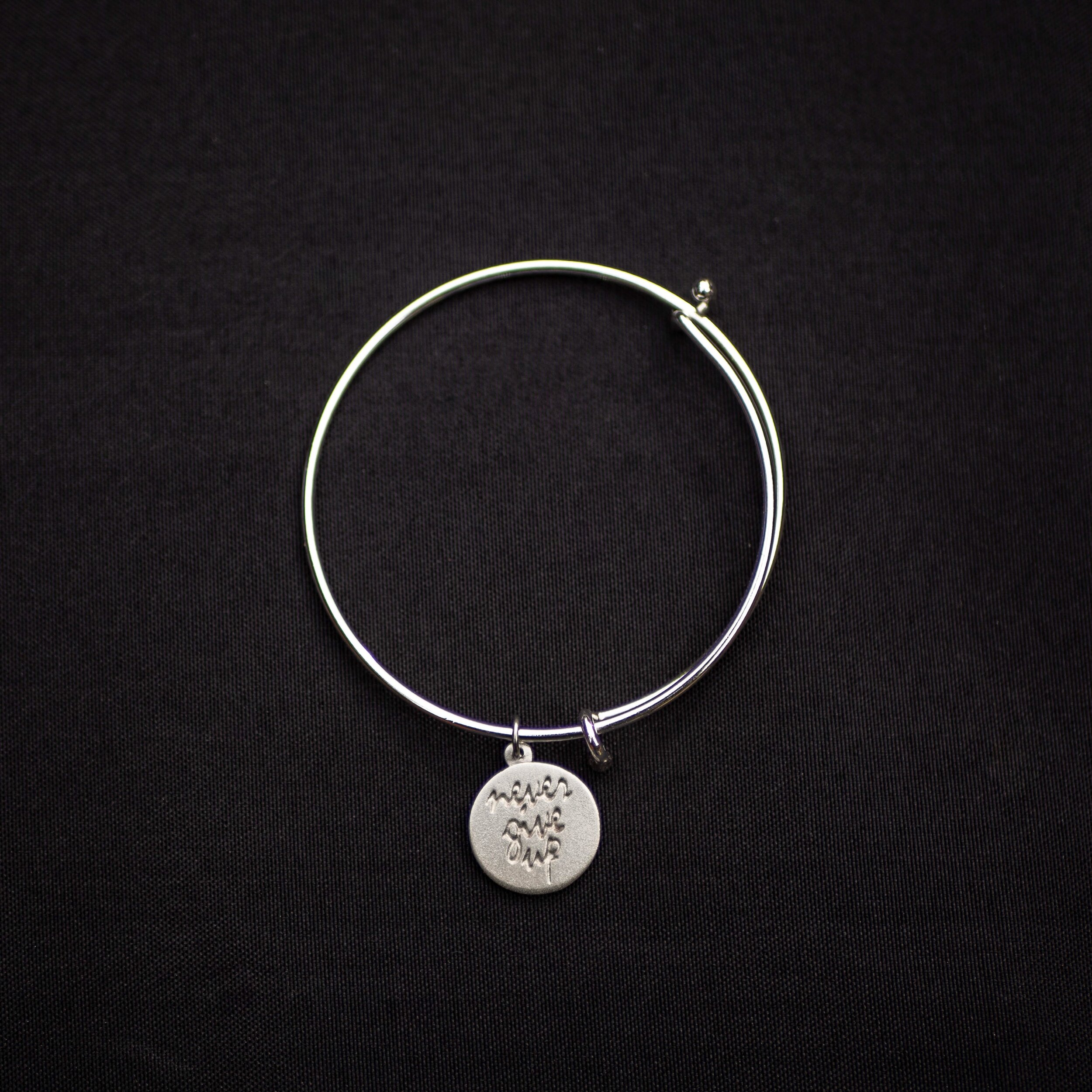 Never Give Up Pewter Bracelet - Front.JPG