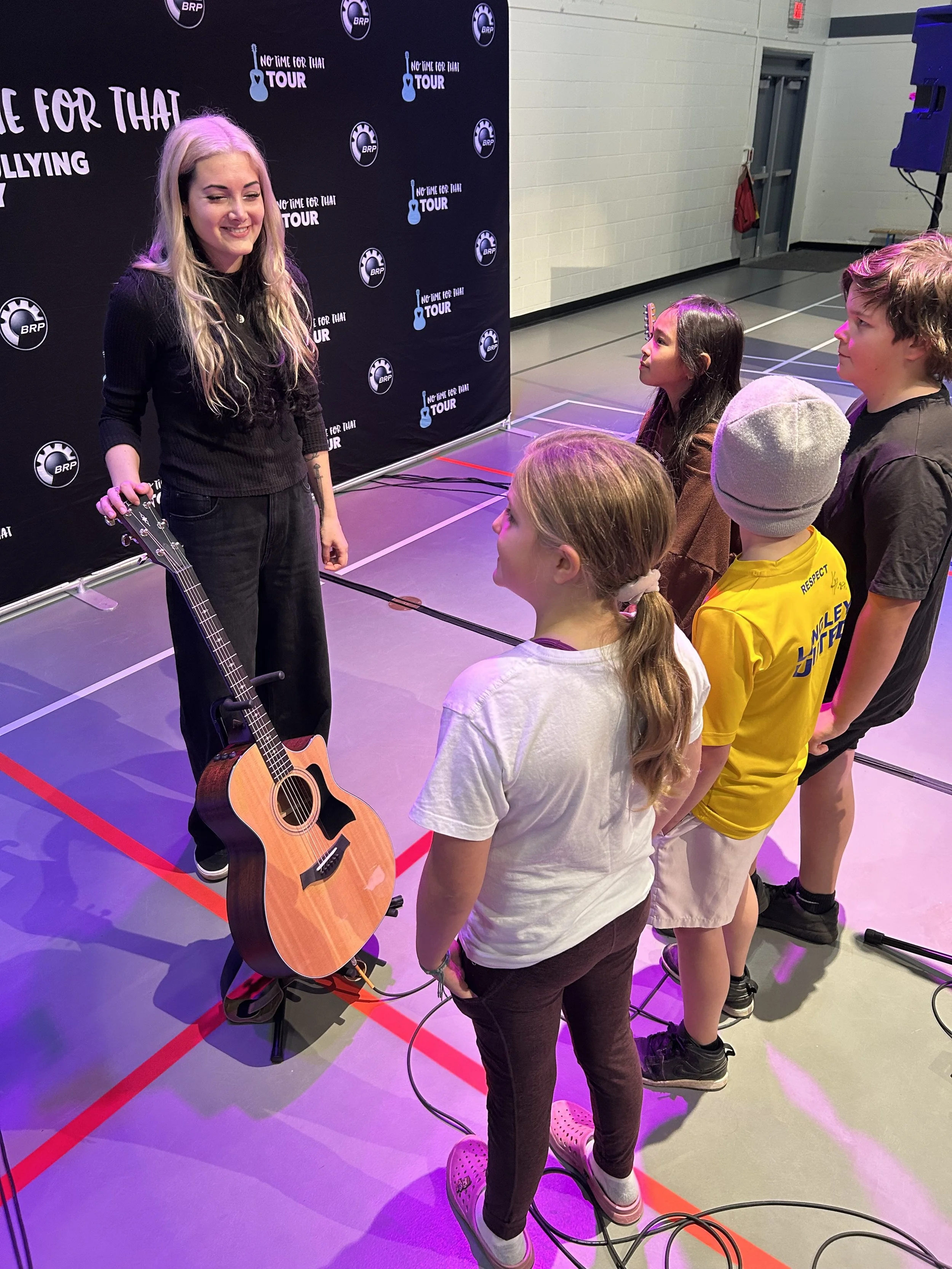 Elsie with Students NTFT Tour.jpeg