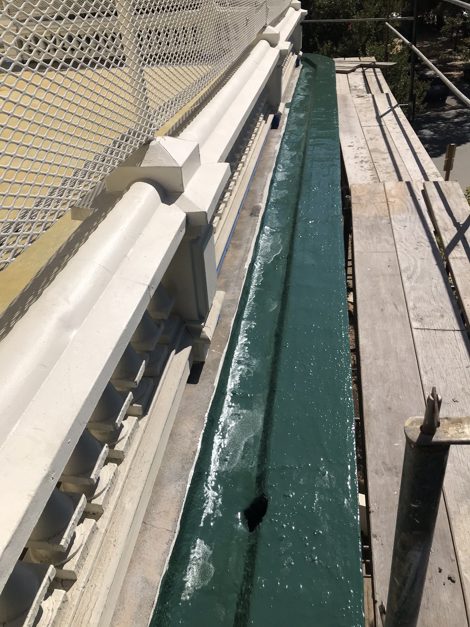 Perimeter Gutter Coated with Pacific-Polymers in Forest Green Top Coat