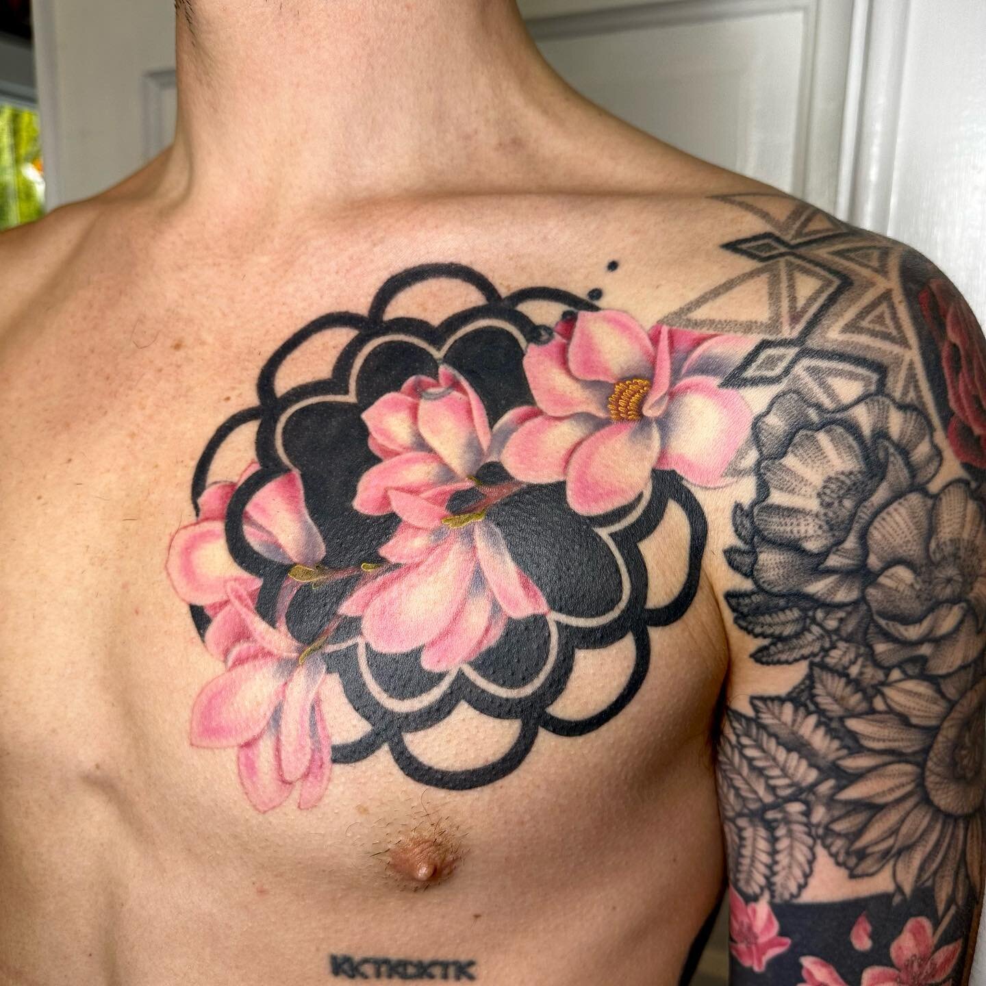 Still shots of this magnolia chest piece &mdash; visit my profile to see the process video! 

That white ink is ✨healed✨ and settled about 7 months.

Sleeve to the right is ✨healed✨ over 3 years. 
🌿🌿🌿
&hellip;
&hellip;
&hellip;
&hellip;
&hellip;
&