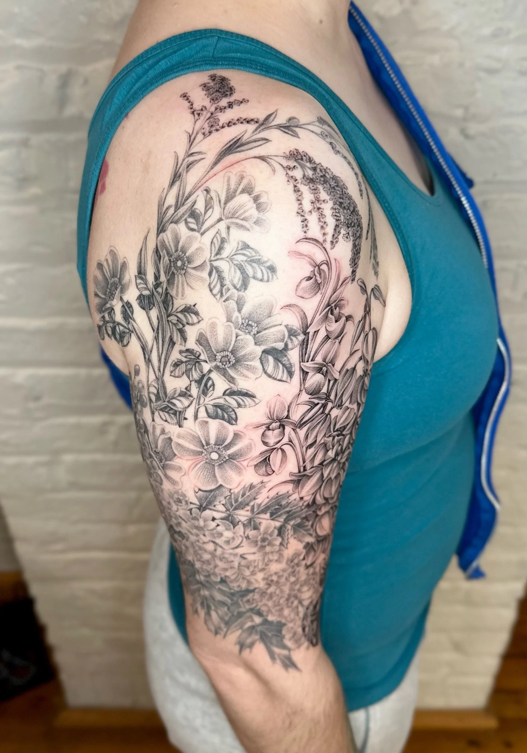 Botanical Floral Half Sleeve Tattoo by Chicago Tattoo Artist