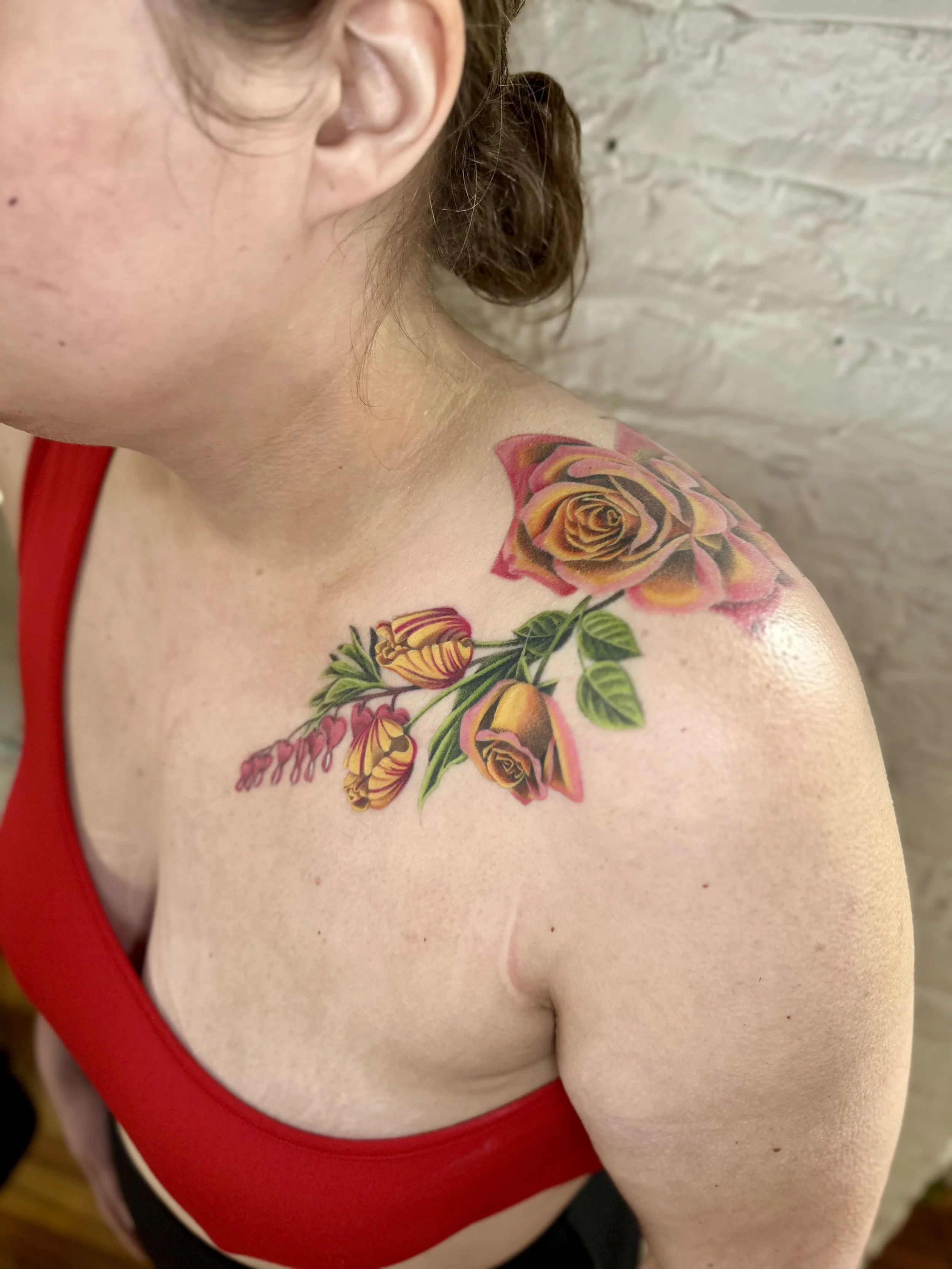 Healed Color Floral Tattoo with Tulips, Sunset Roses, and Bleeding Hearts