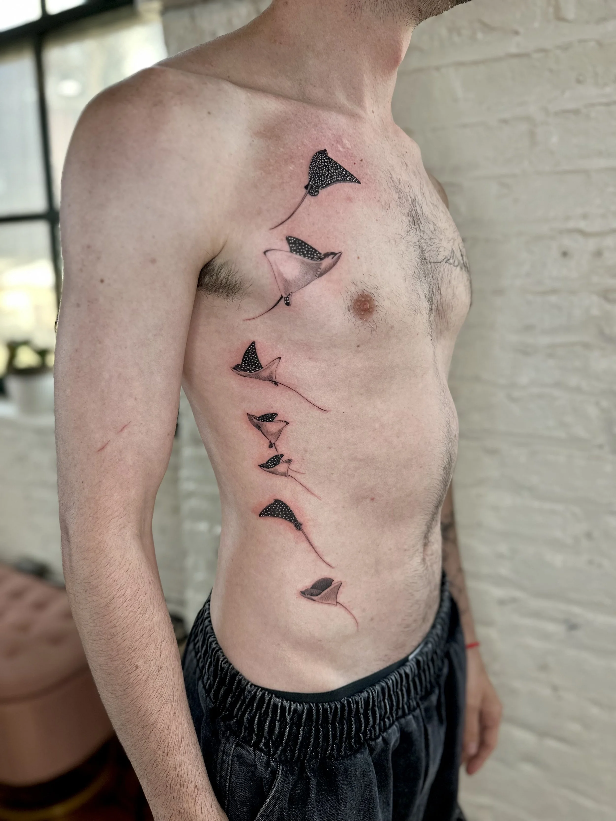 Fine Line Spotted Eagle Ray Tattoo | Emily May Fong
