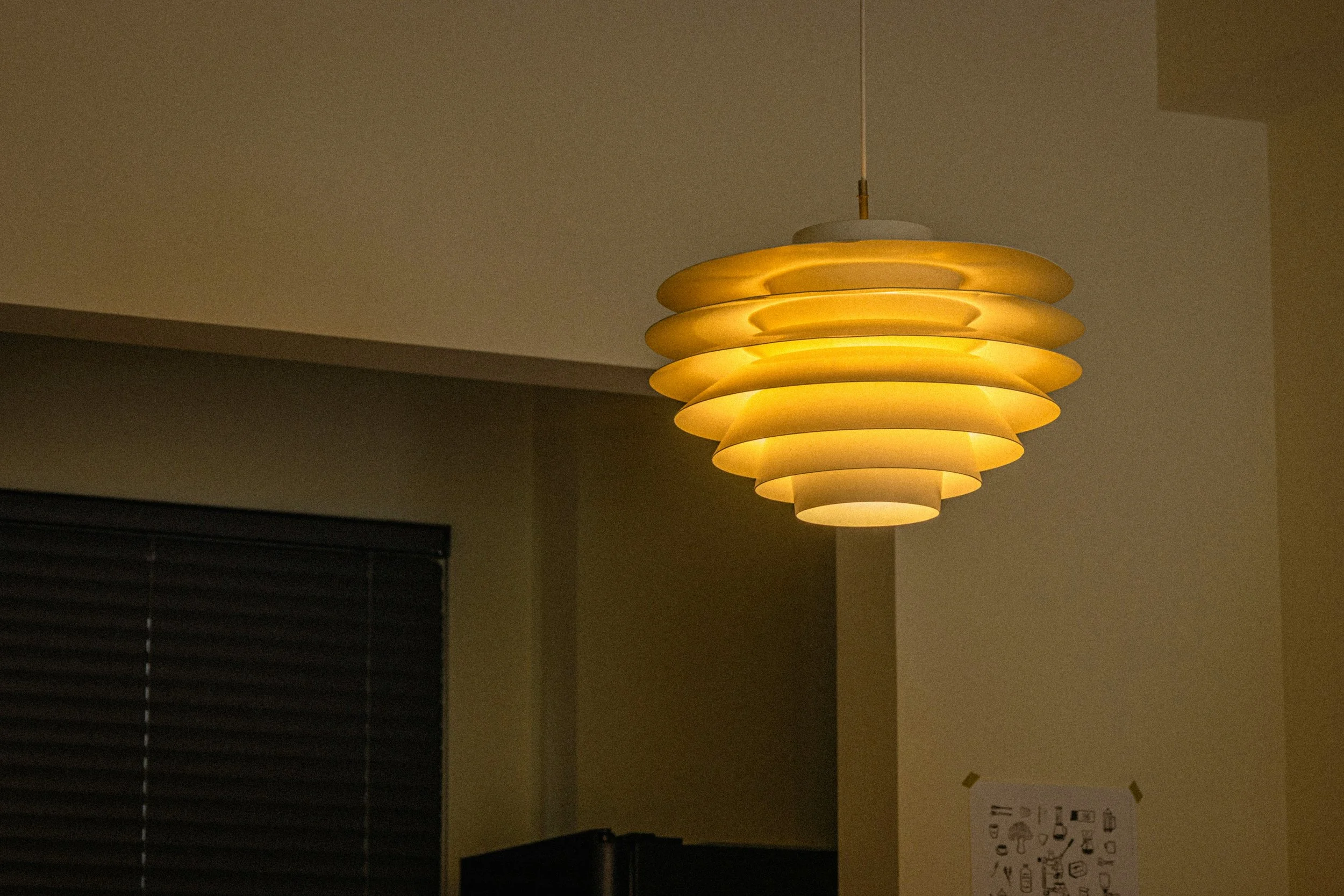 Warm lighting ideas for cozy living room with soft table lamp glow