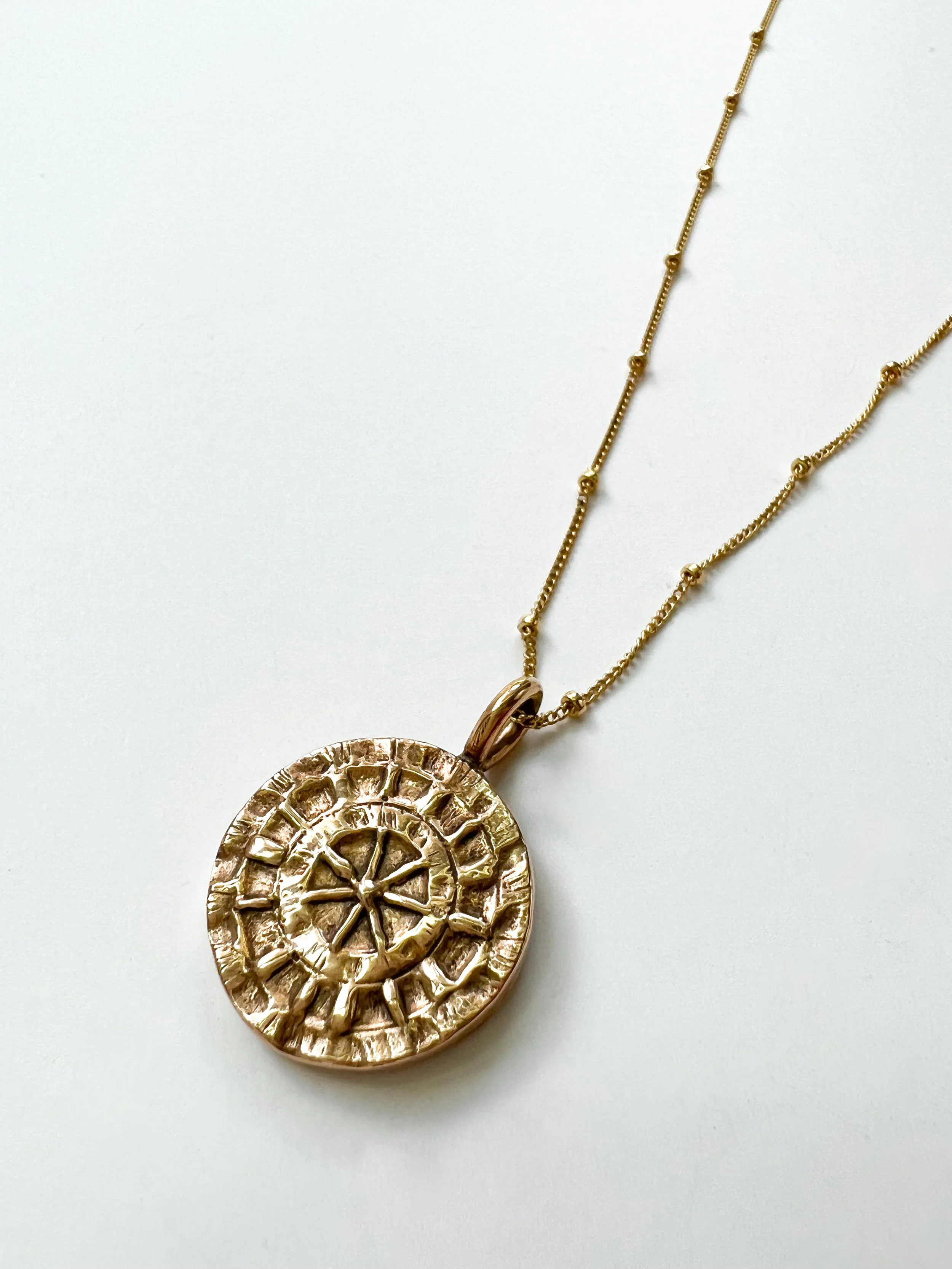 "Opposites Attract" Medallion Necklace Ancient Bronze