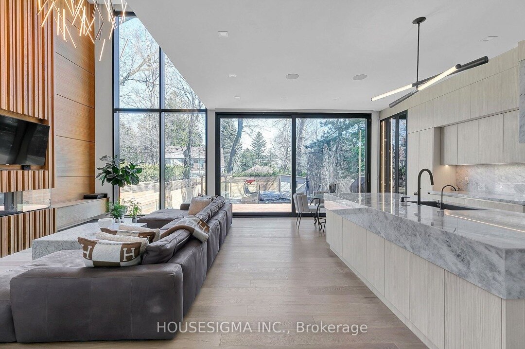 Welcome to Unrivaled Luxury in the Cricket Club! 🏡 This custom-built home sits on a sprawling 33' widening to 44' x 165' lot, offering over 6,000 sq ft of luxurious living space. Professionally manicured grounds surround this stunning home, with nat