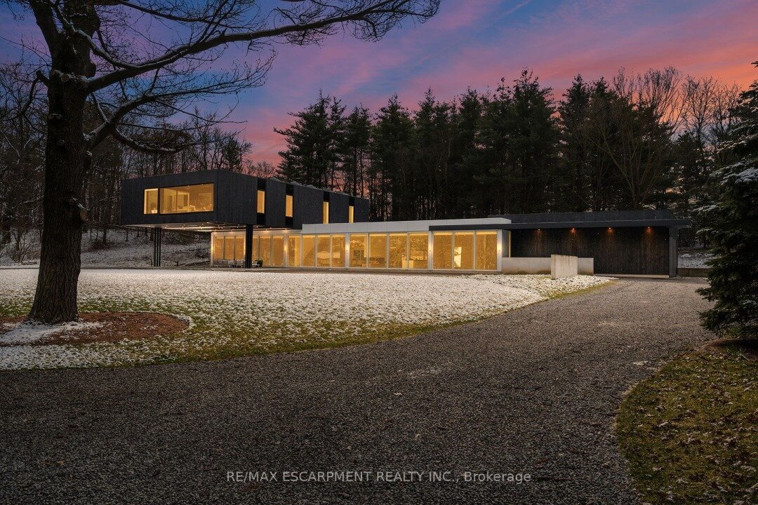 Welcome to your ultimate California-style dream home, situated on a phenomenal 6-acre parcel of land in Dundas. This net zero ready home was carefully crafted by DB Custom Homes and designed by SMPL. Step inside and immediately appreciate the clean l