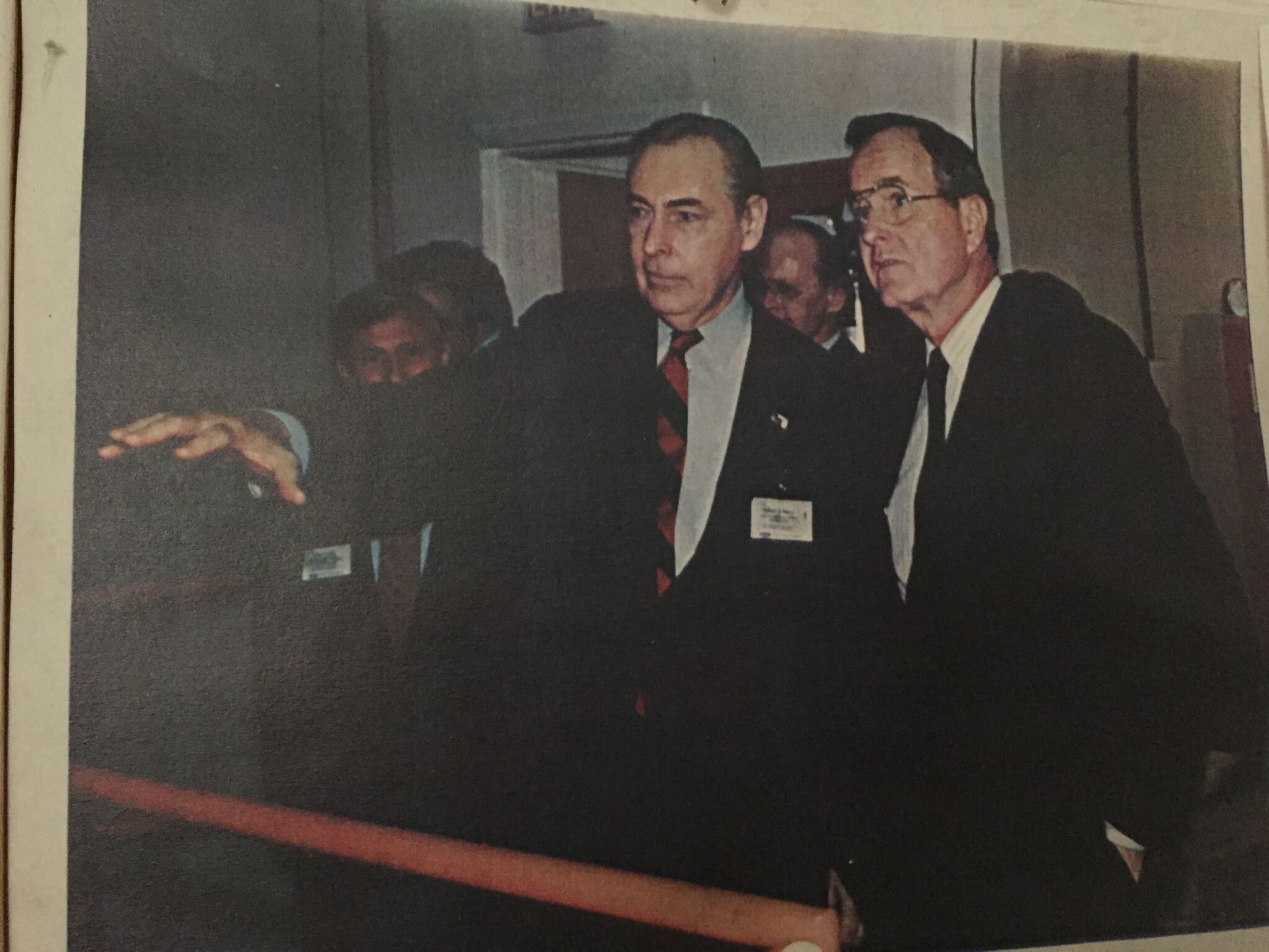 Robert E. Berry Guides President George H. W. Bush during a tour of SSL Headquarters in Palo Alto, CA.jpg