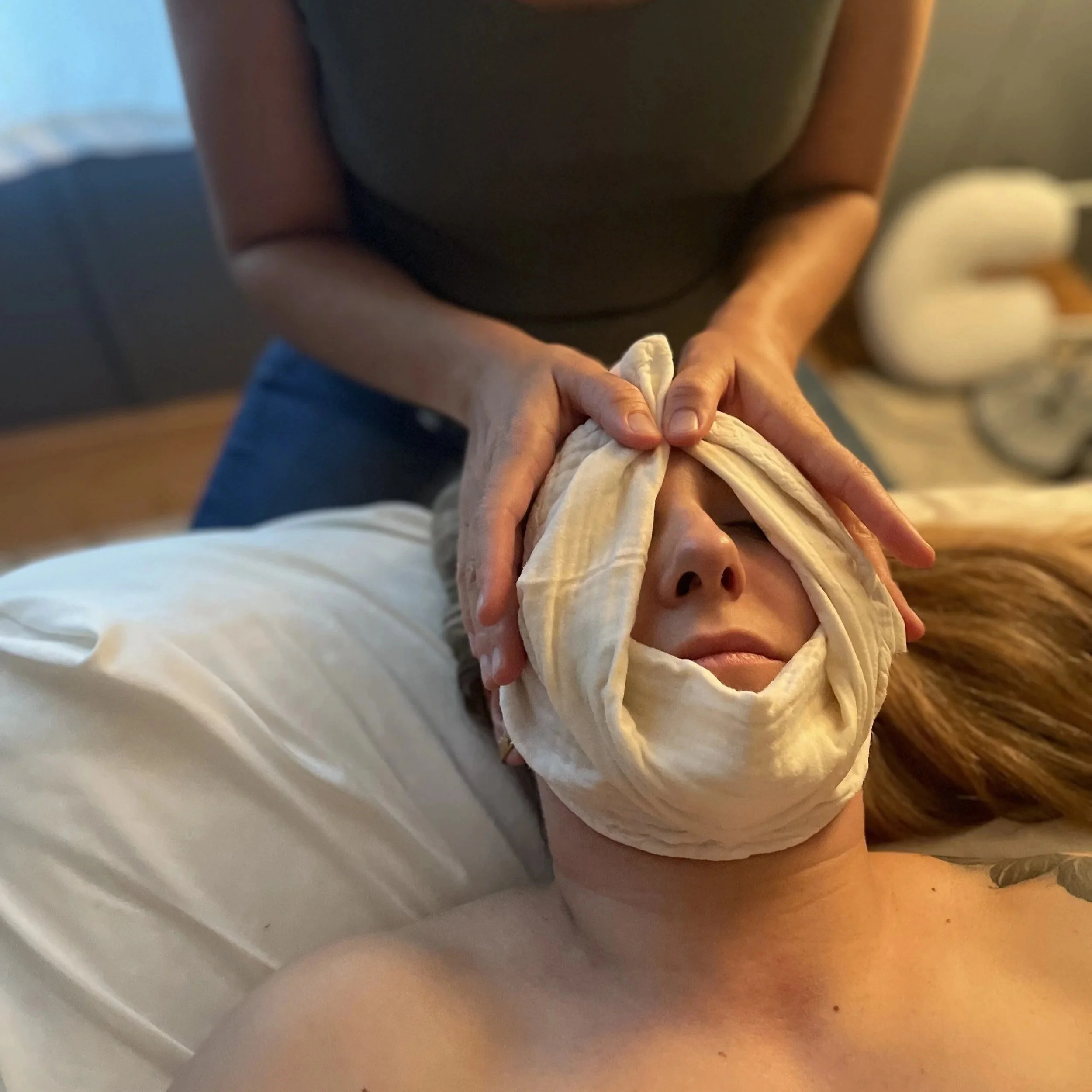 A warm face towel that is part of our facial rejuvenation treatment at Revive